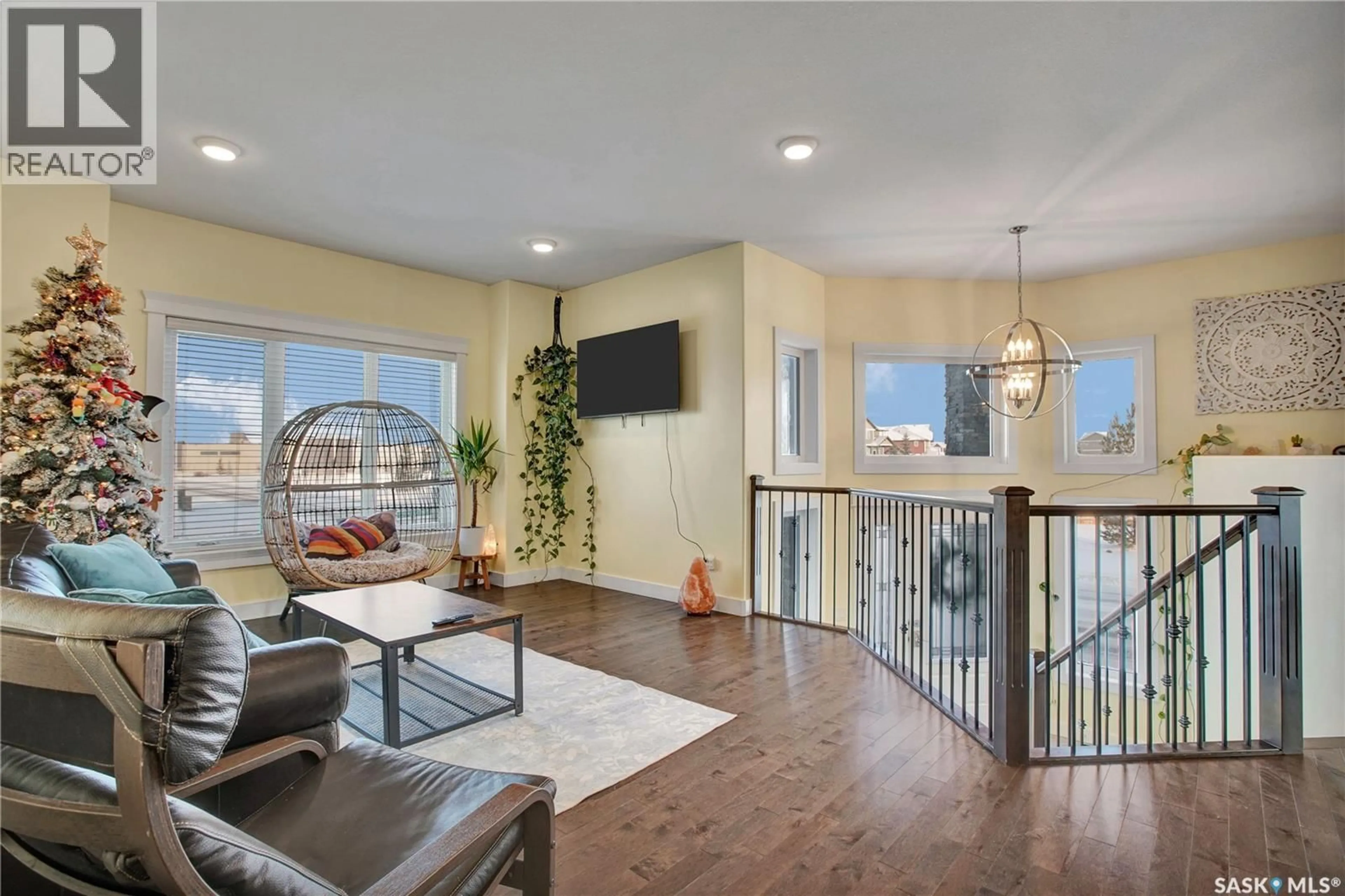 Living room with furniture, unknown for 520 COUPLES COURT, Warman Saskatchewan S0K4S1