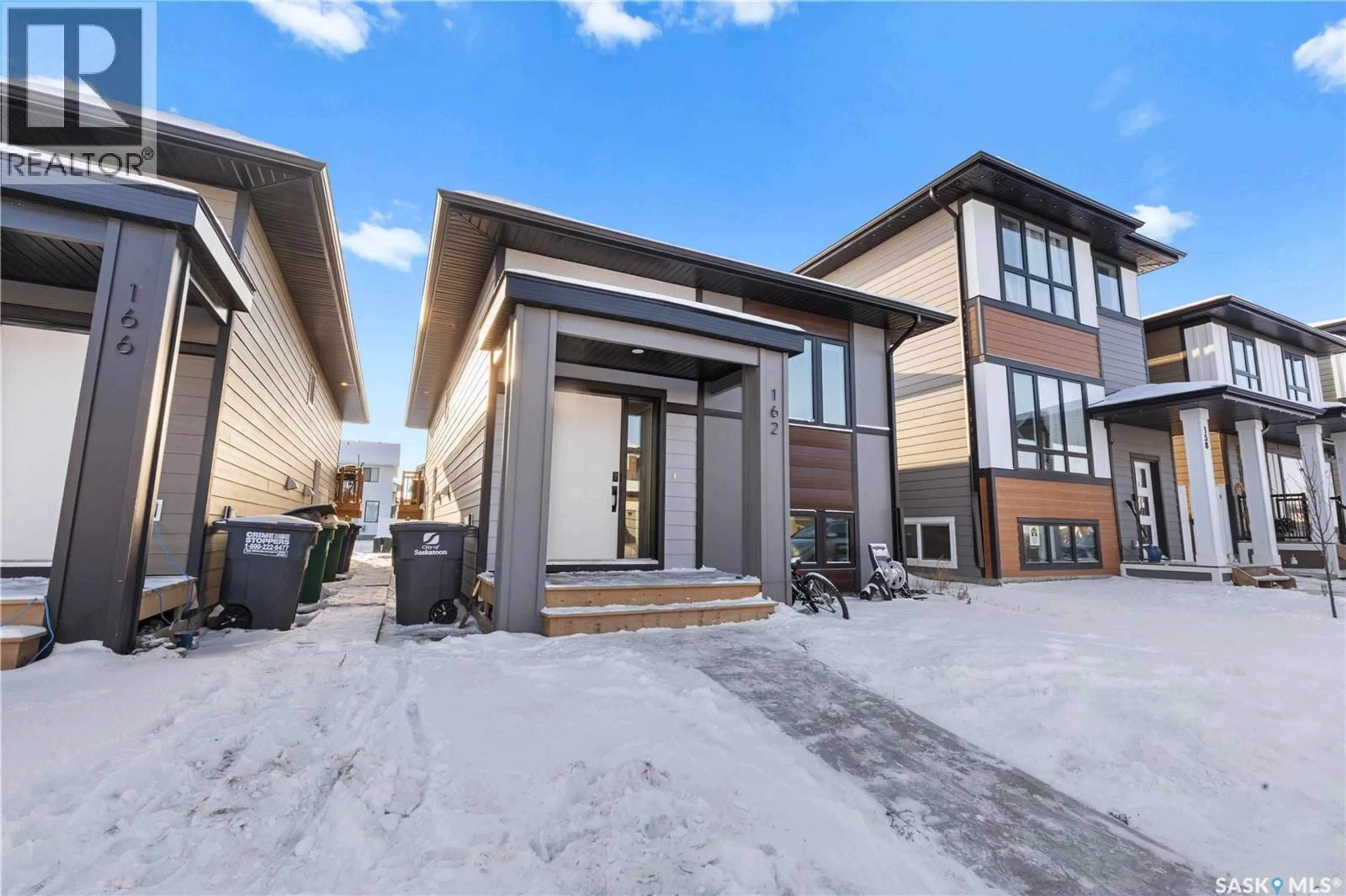 Home with brick exterior material, street for 162 LESKIW LANE, Saskatoon Saskatchewan S7V1R6