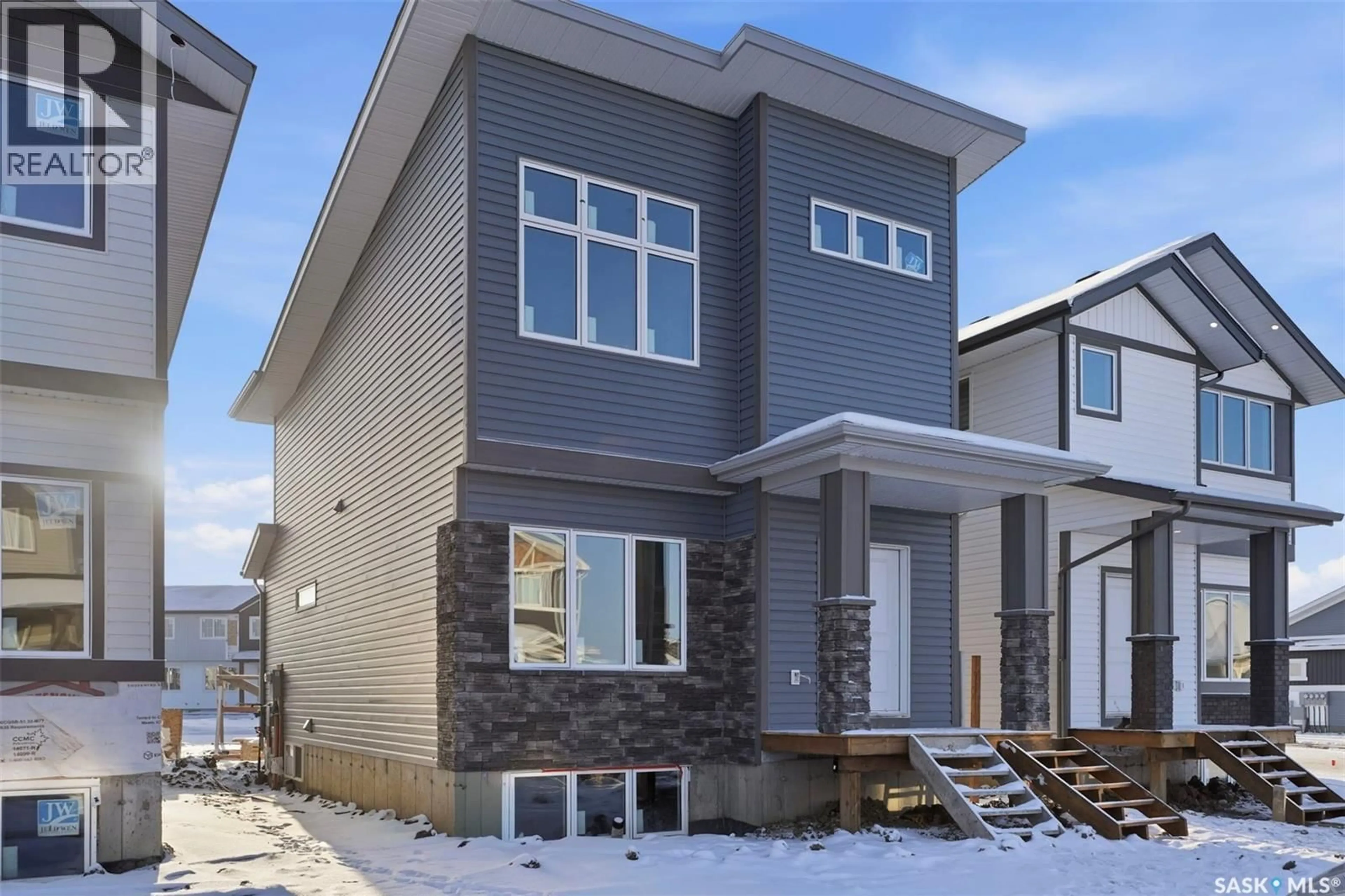 Home with vinyl exterior material, street for 1404 BESNARD DRIVE, Martensville Saskatchewan S0K2T1