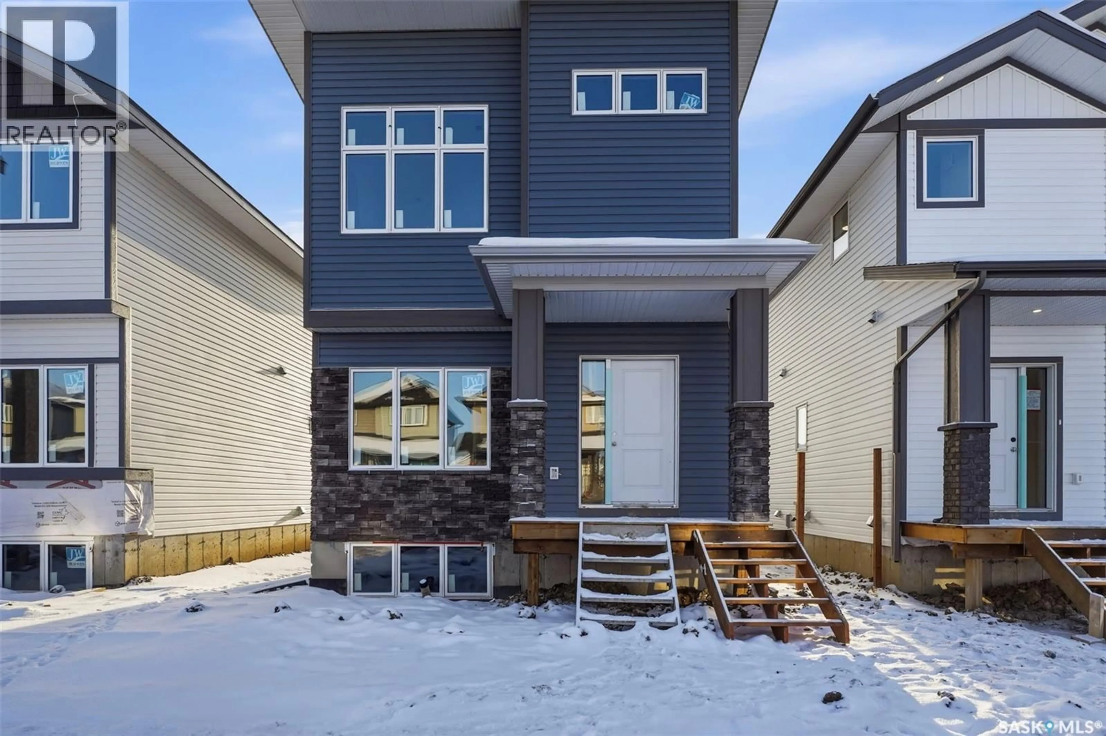 Home with brick exterior material, street for 1404 BESNARD DRIVE, Martensville Saskatchewan S0K2T1