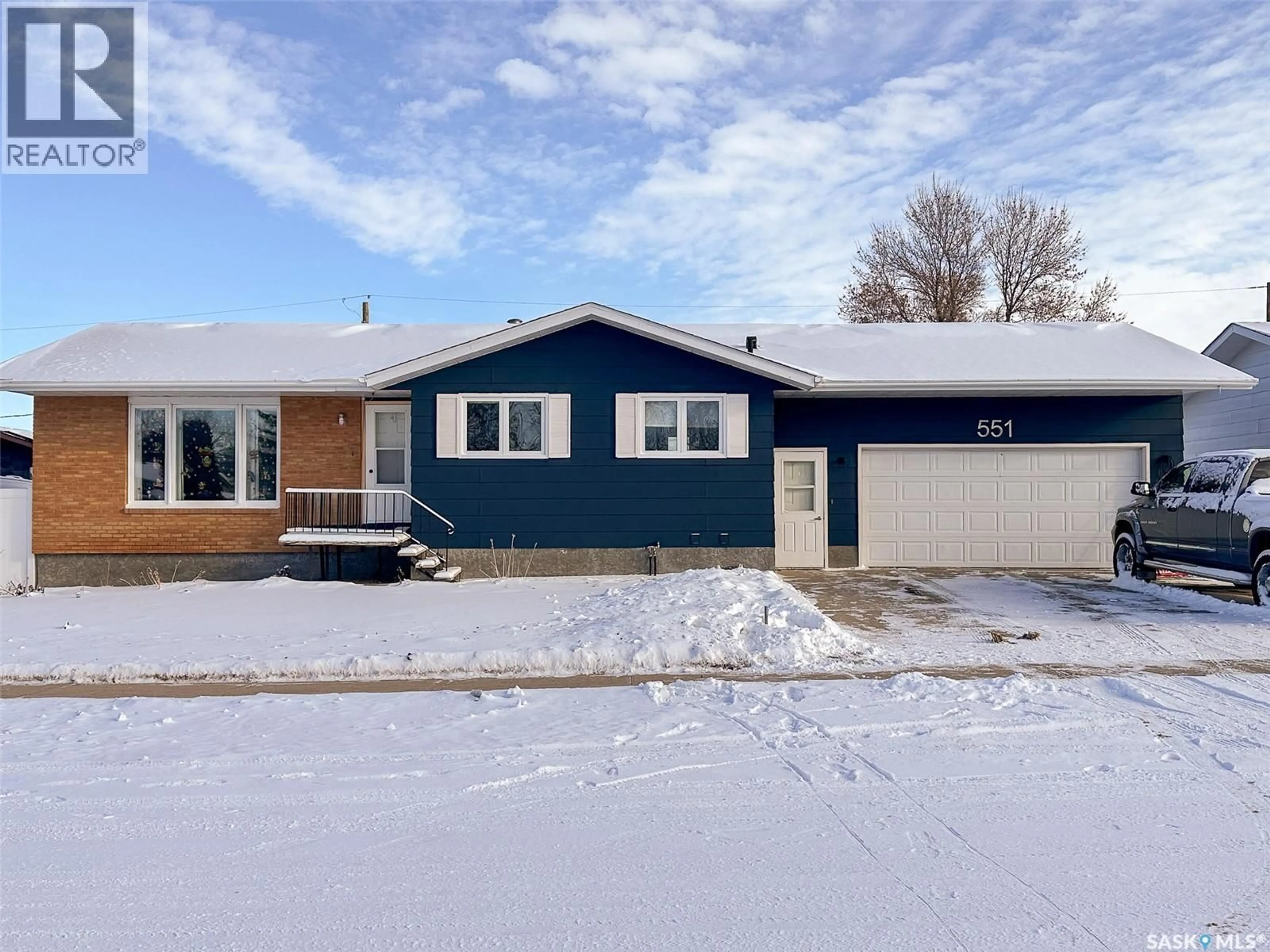 Home with vinyl exterior material, street for 551 1ST STREET, Lafleche Saskatchewan S0H2K0