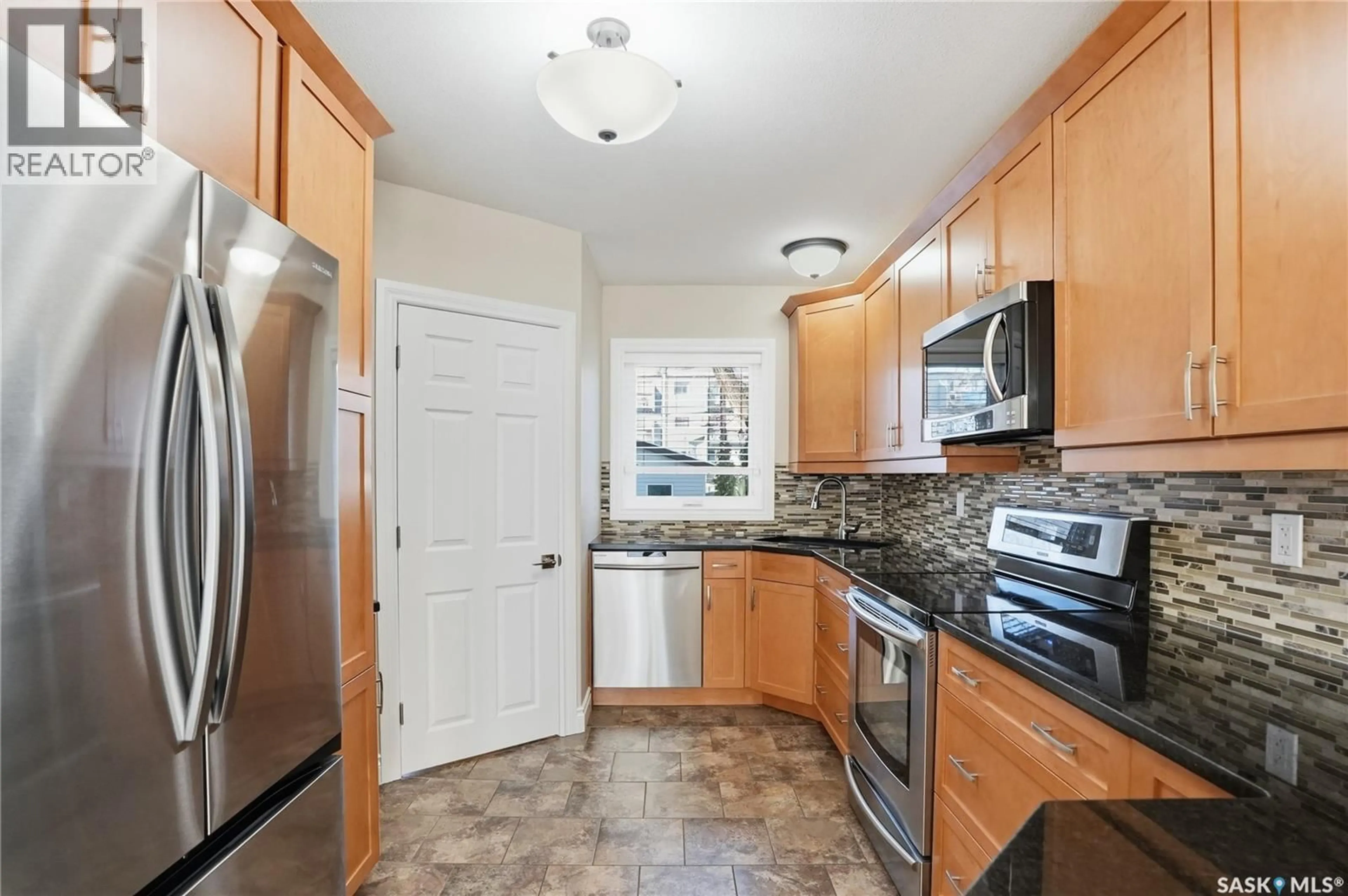 Standard kitchen, ceramic/tile floor for 421 9TH STREET, Saskatoon Saskatchewan S7N0A7