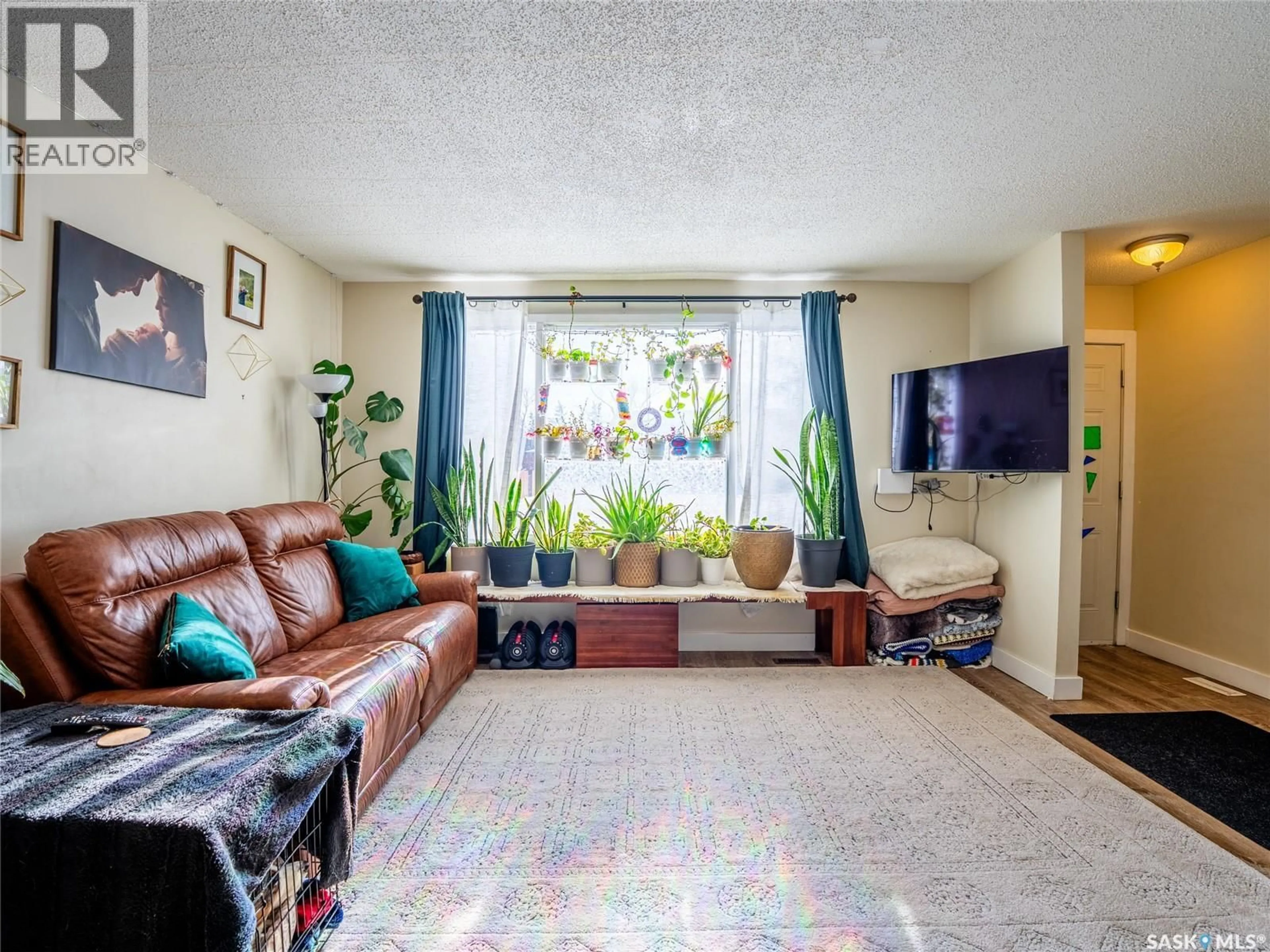 Living room with furniture, unknown for 58 MACKENZIE MEWS, Regina Saskatchewan S4N5M5