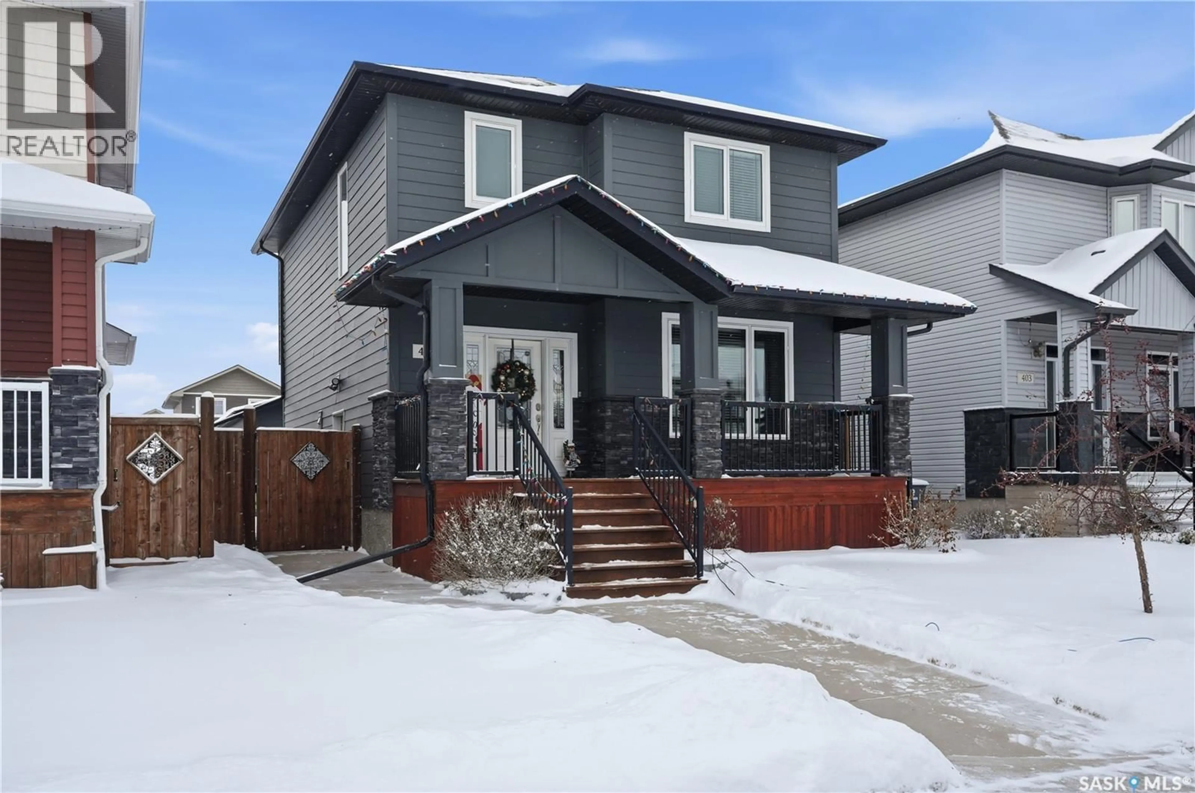 Home with vinyl exterior material, street for 405 GOLDEN WILLOW WAY, Warman Saskatchewan S0K0A1