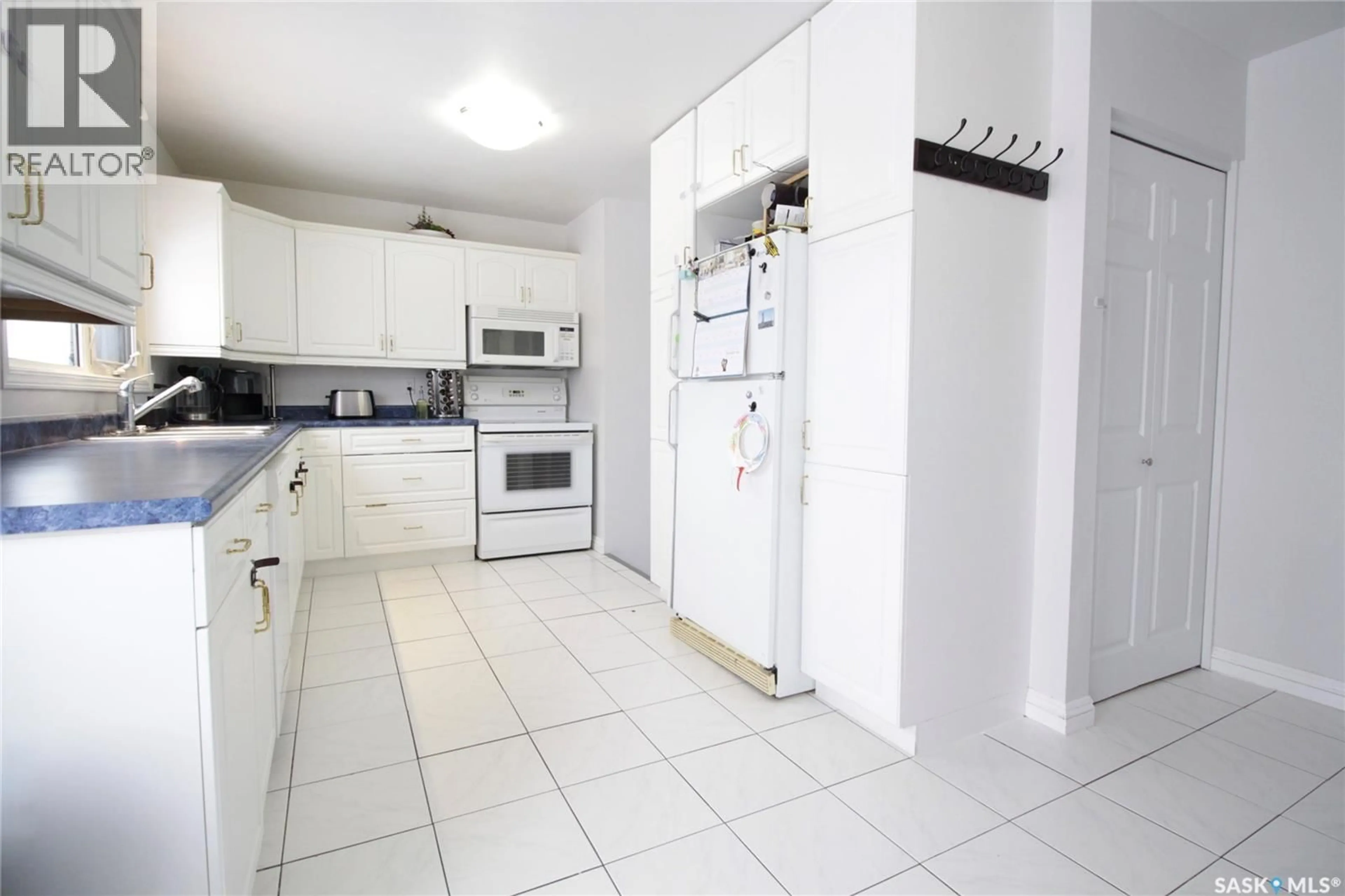 Standard kitchen, ceramic/tile floor for 1106 BOBOLINK BAY, Rocanville Saskatchewan S0A3L0