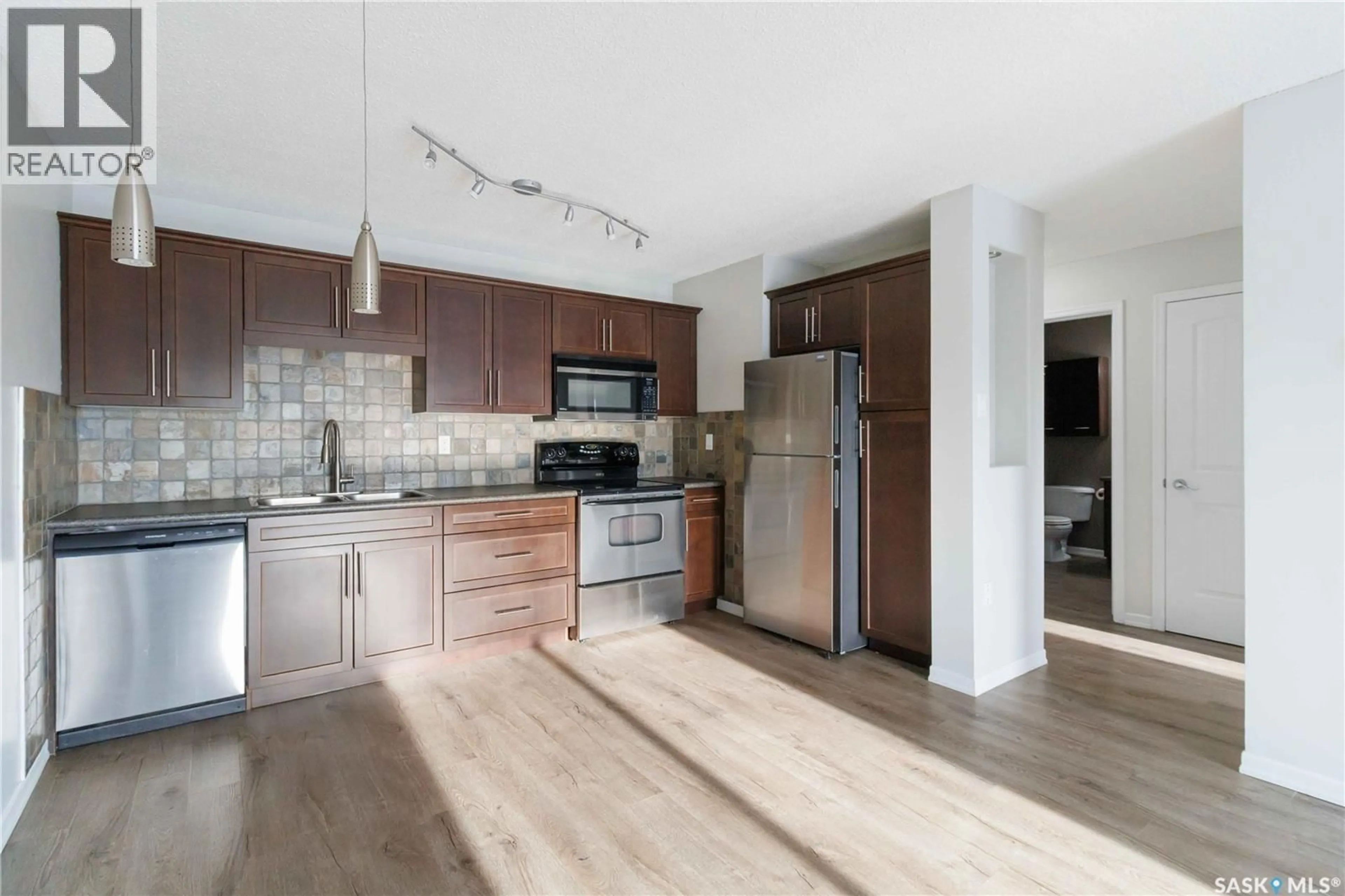 Open concept kitchen, unknown for 24 2 SUMMERS PLACE, Saskatoon Saskatchewan S7H3W4