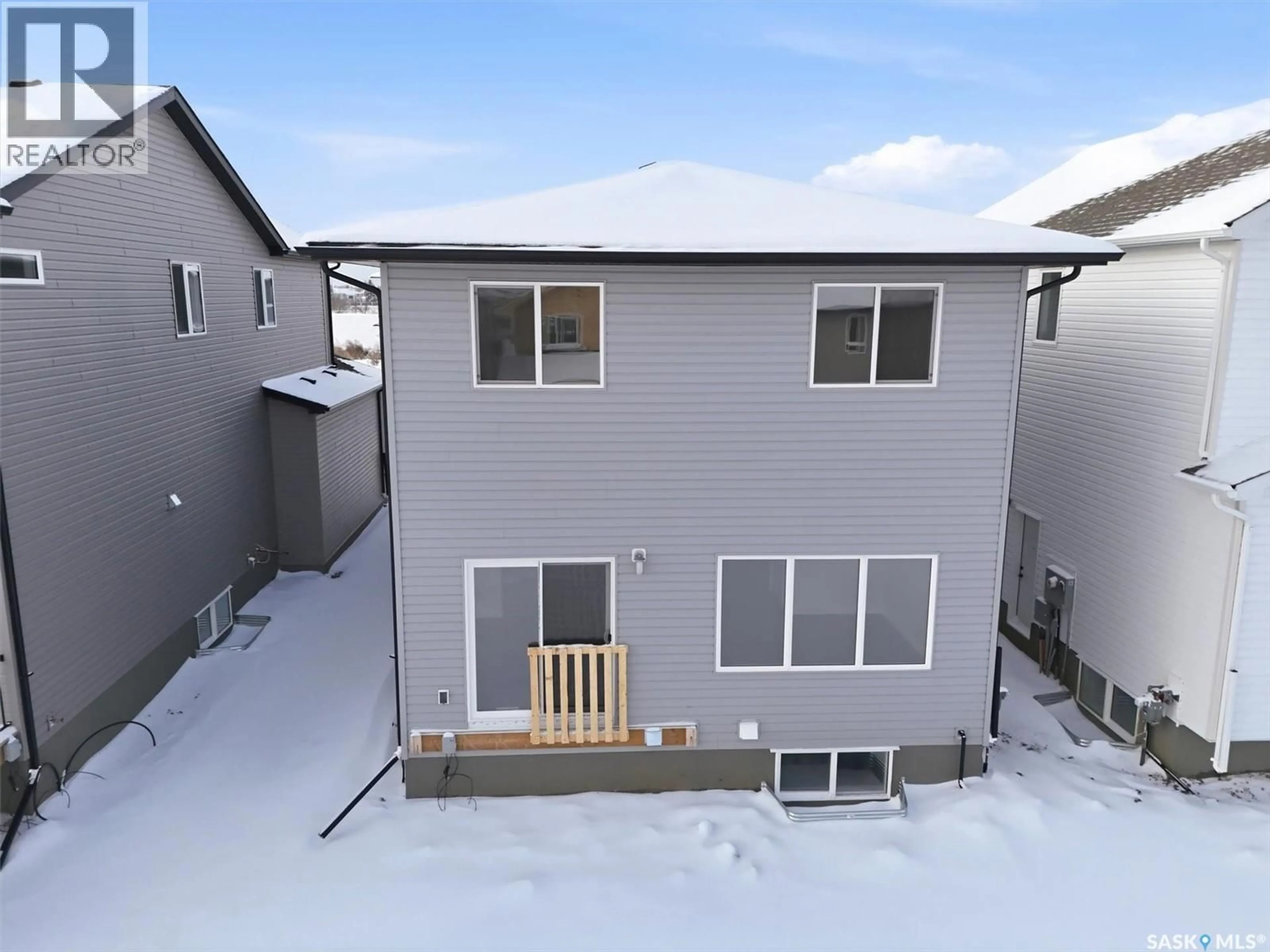 A pic from outside/outdoor area/front of a property/back of a property/a pic from drone, unknown for 414 COCKCROFT PLACE, Saskatoon Saskatchewan S7V1Y9