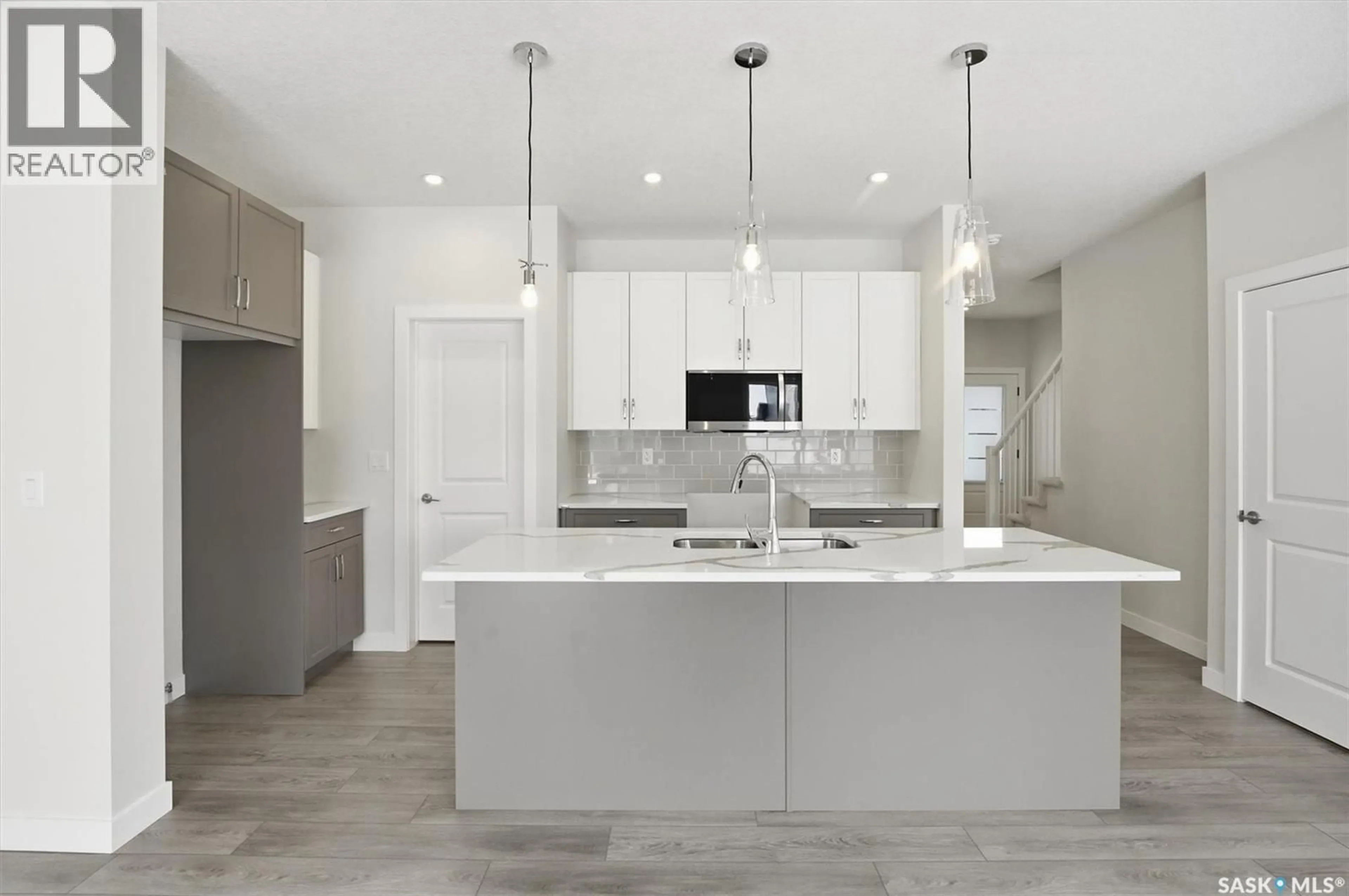 Open concept kitchen, ceramic/tile floor for 414 COCKCROFT PLACE, Saskatoon Saskatchewan S7V1Y9