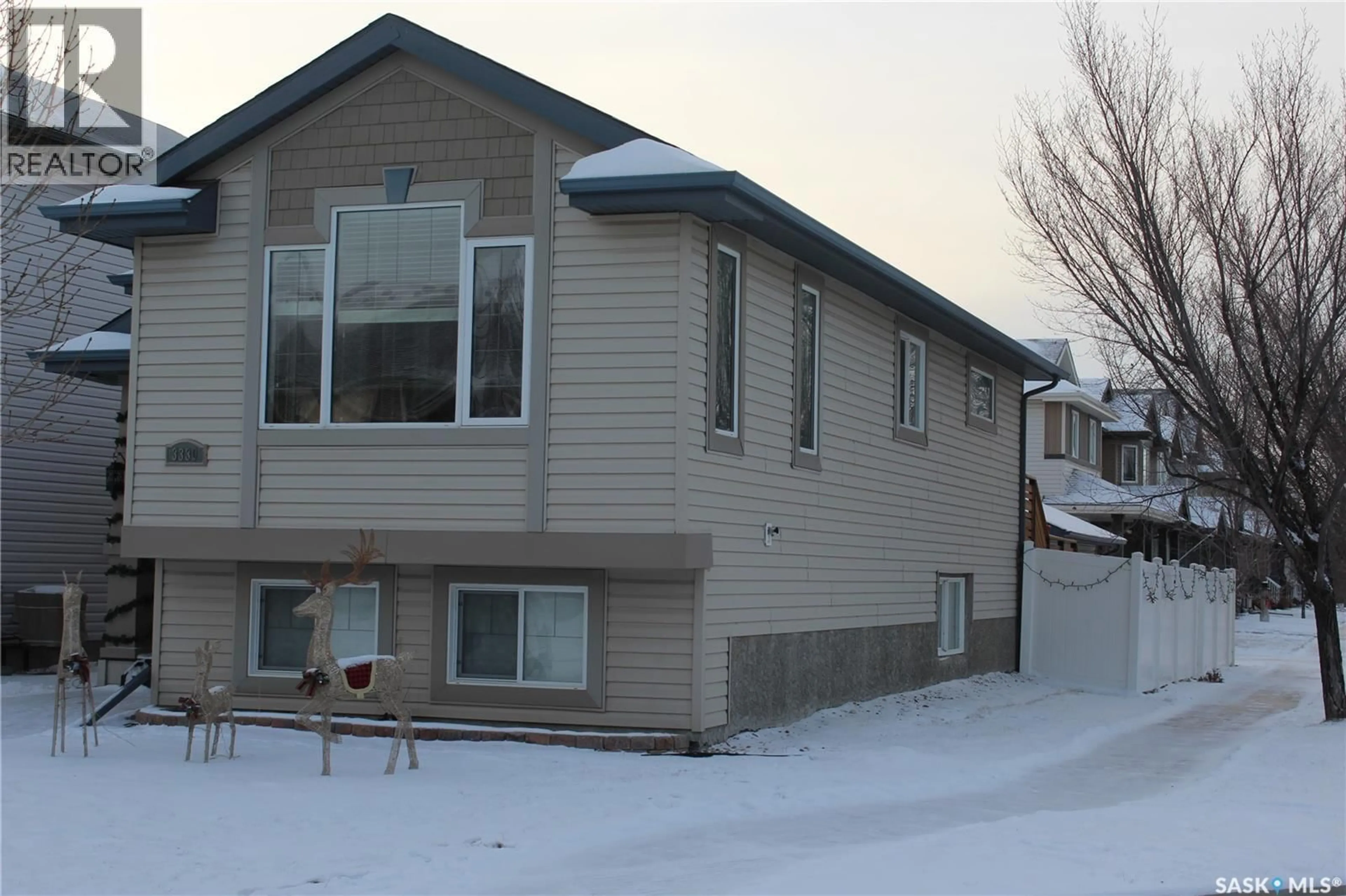 Home with vinyl exterior material, street for 3330 GREEN MOSS LANE, Regina Saskatchewan S4V1P2