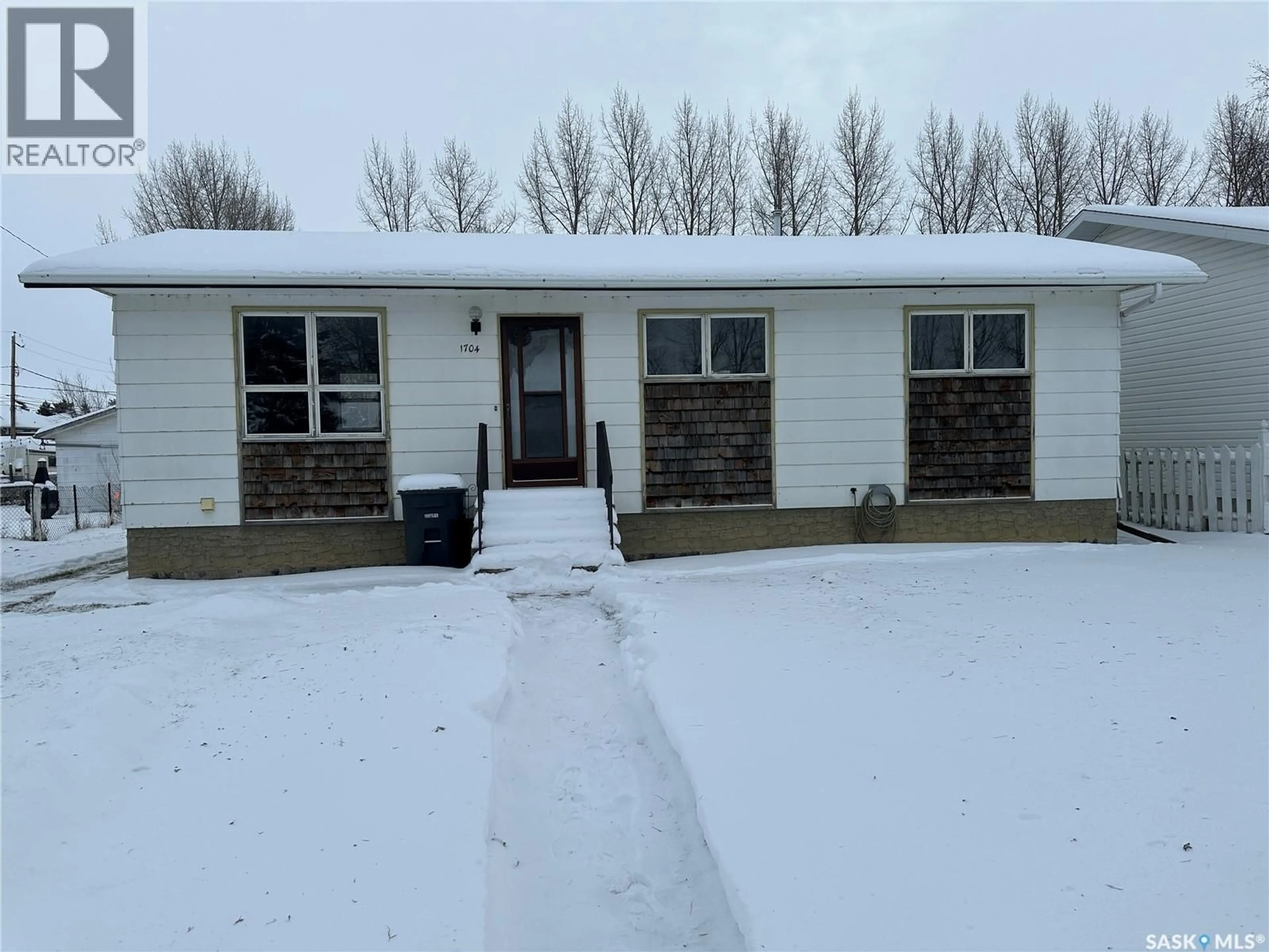 A pic from outside/outdoor area/front of a property/back of a property/a pic from drone, unknown for 1704 1ST AVENUE, Rosthern Saskatchewan S0K3R0