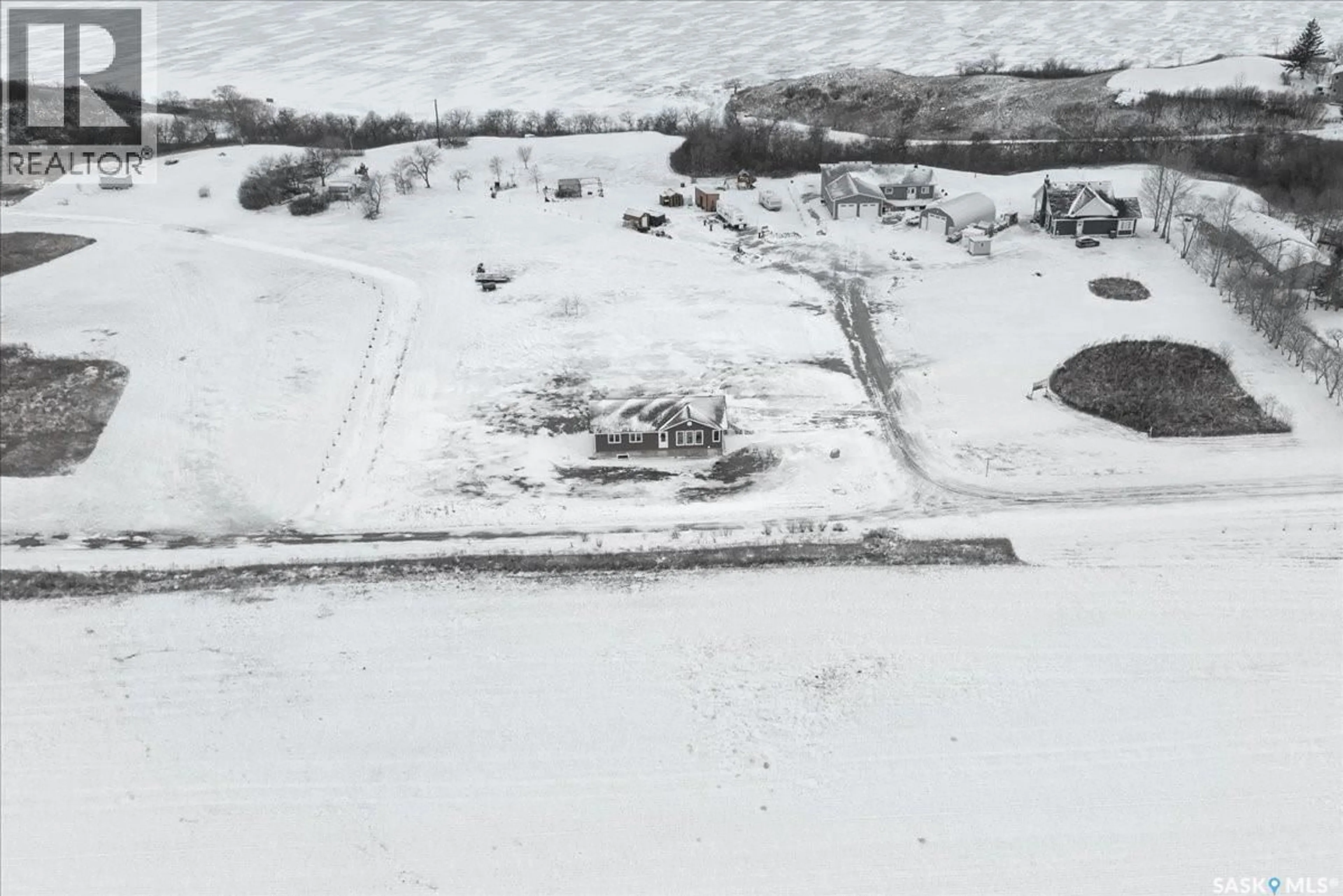 A pic from outside/outdoor area/front of a property/back of a property/a pic from drone, street for 11 JESSE BAY, Mckillop Rm No. 220 Saskatchewan S0G4V0