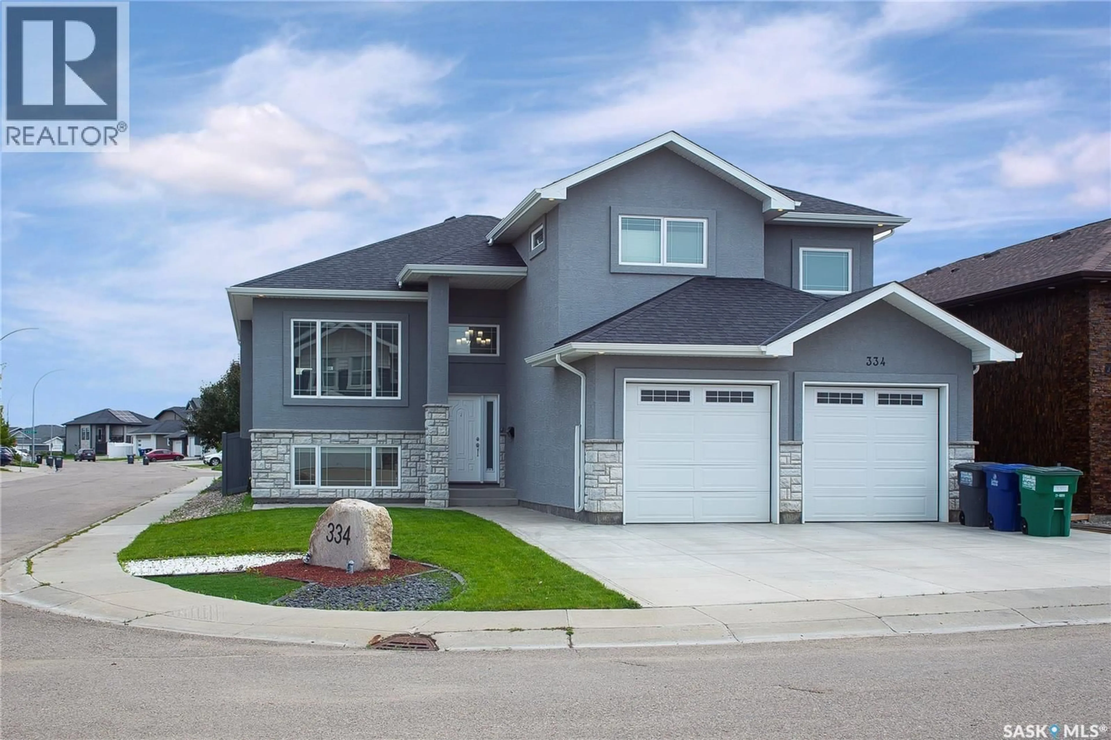 Home with vinyl exterior material, street for 334 GILLIES CRESCENT, Saskatoon Saskatchewan S7V0J9