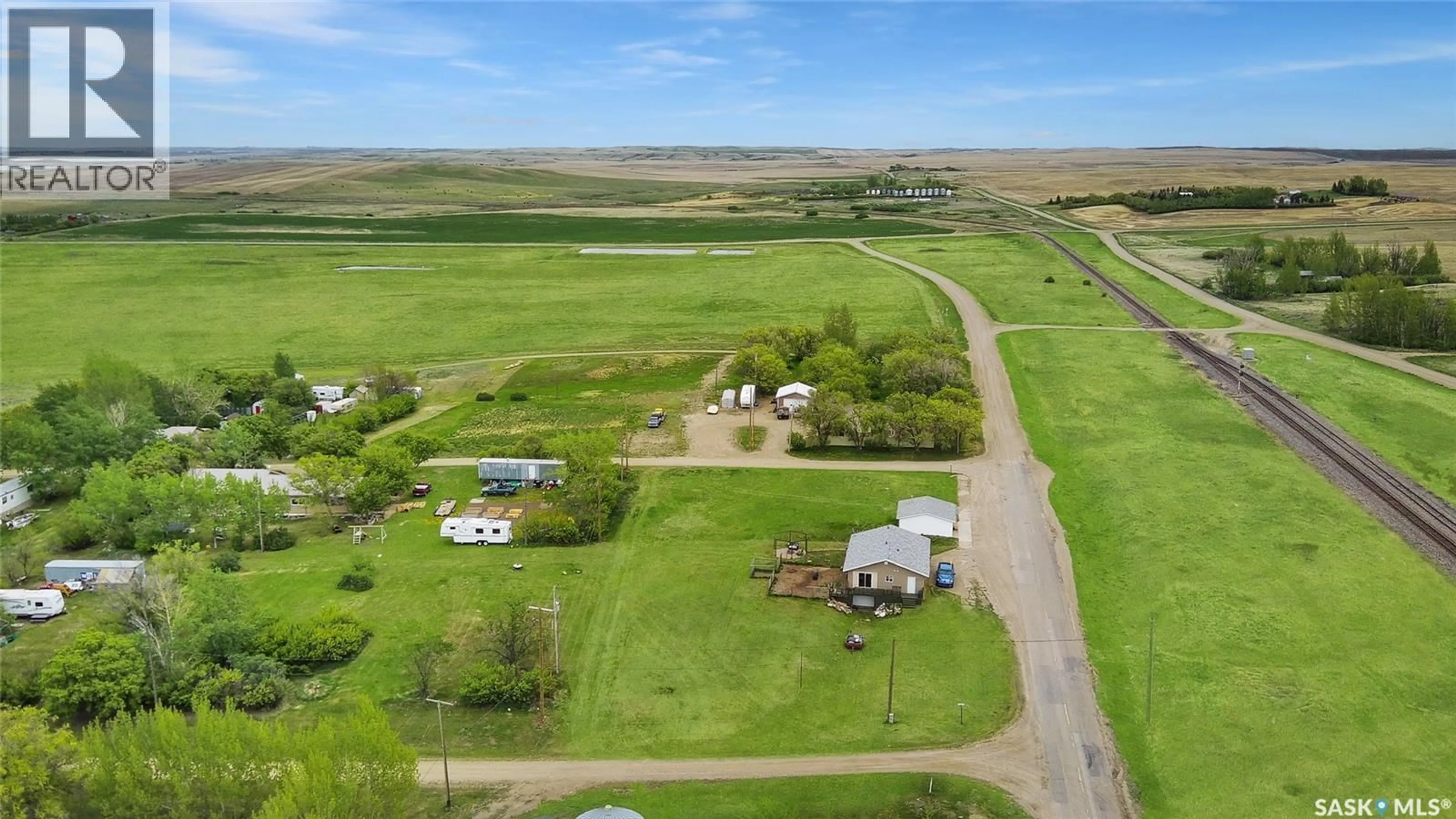 A pic from outside/outdoor area/front of a property/back of a property/a pic from drone, water/lake/river/ocean view for 800 RAILWAY AVENUE, Webb Saskatchewan S0N2X0