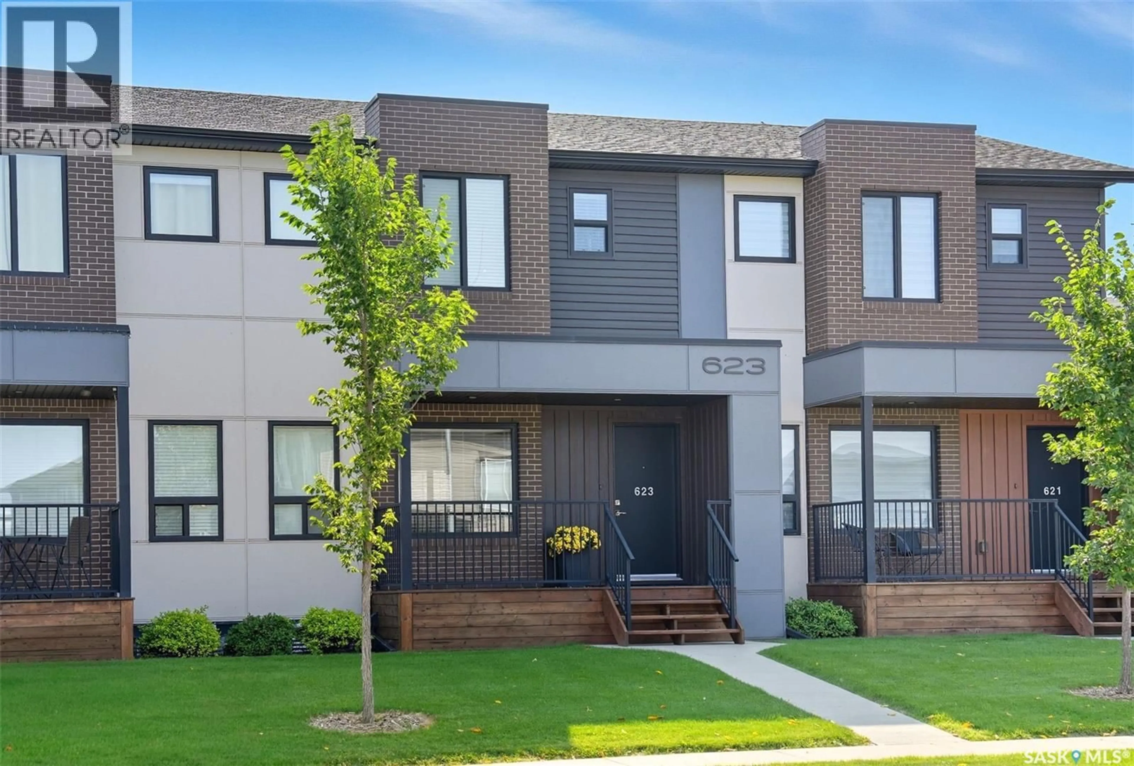 Home with brick exterior material, street for 623 EVERGREEN BOULEVARD, Saskatoon Saskatchewan S7K6K3