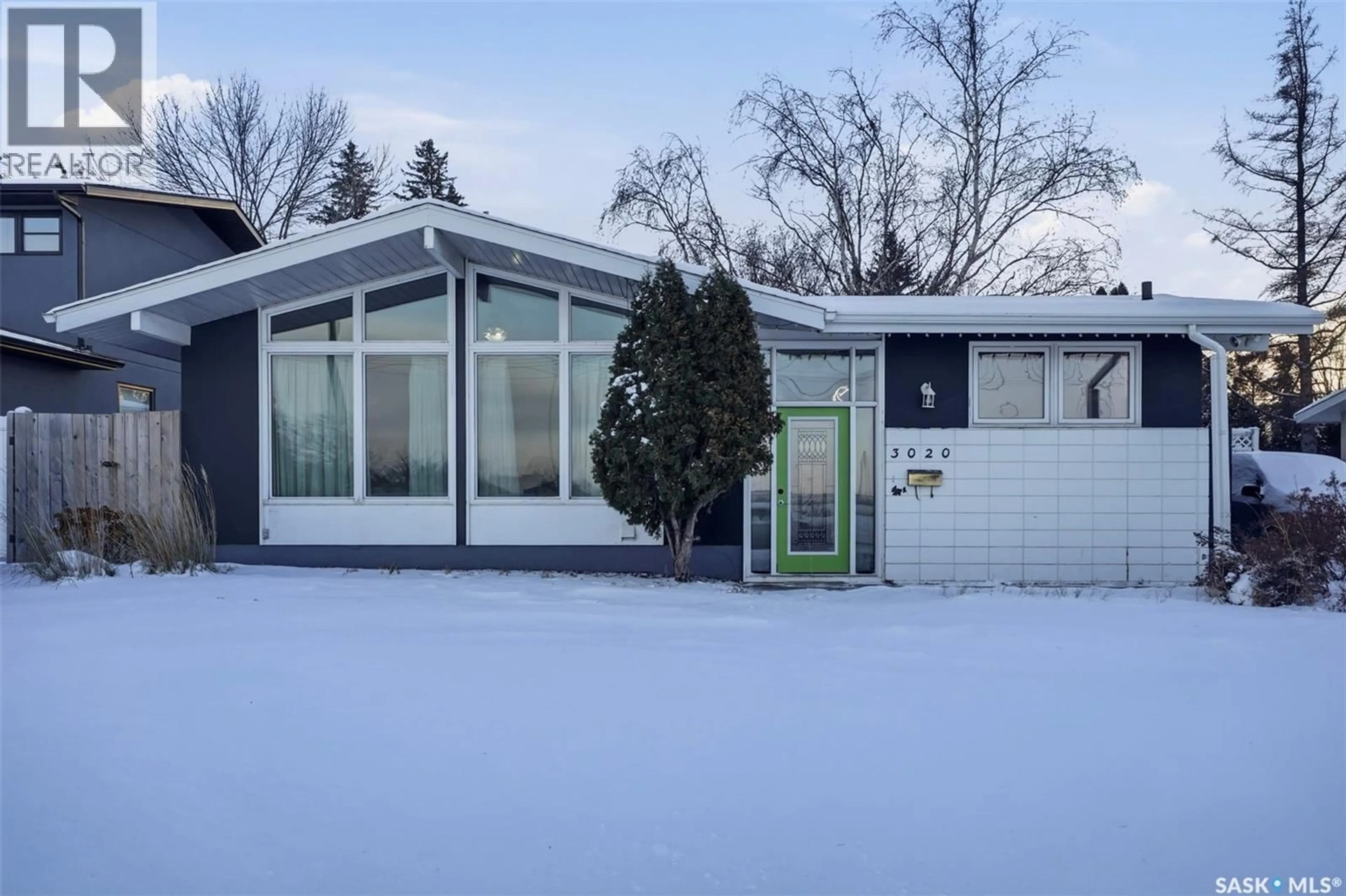 Home with vinyl exterior material, street for 3020 14TH STREET, Saskatoon Saskatchewan S7H0B4
