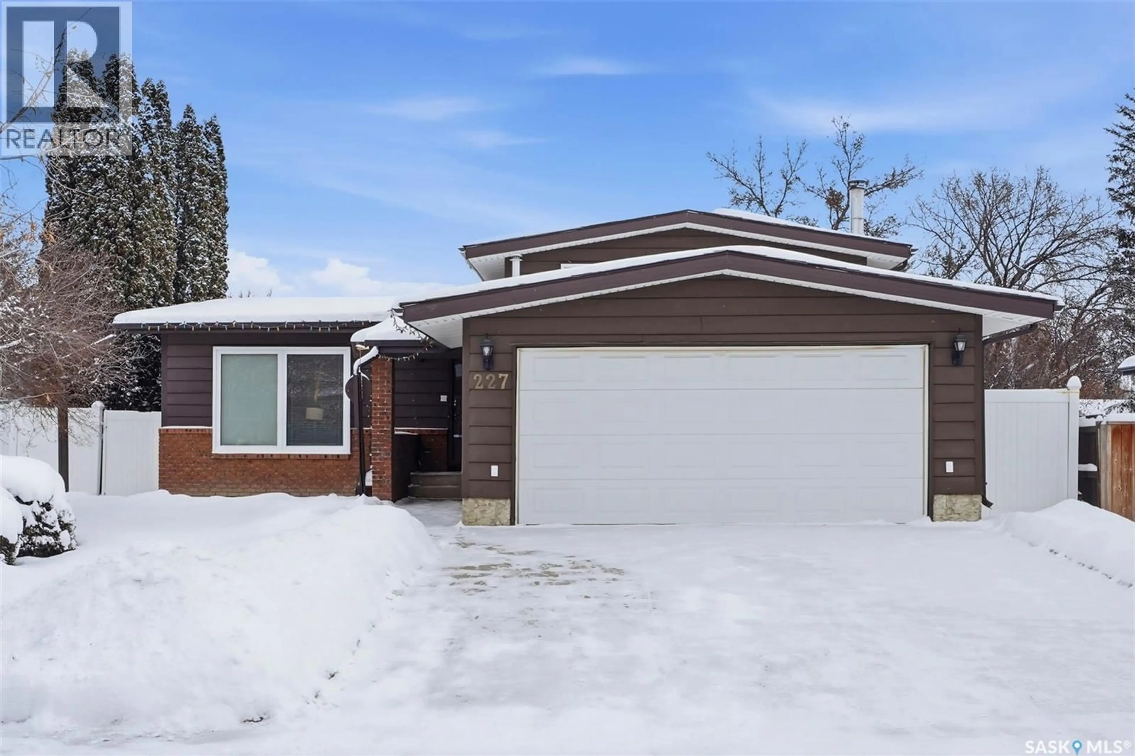 Home with vinyl exterior material, street for 227 SYLVIAN WAY, Saskatoon Saskatchewan S7H5G1