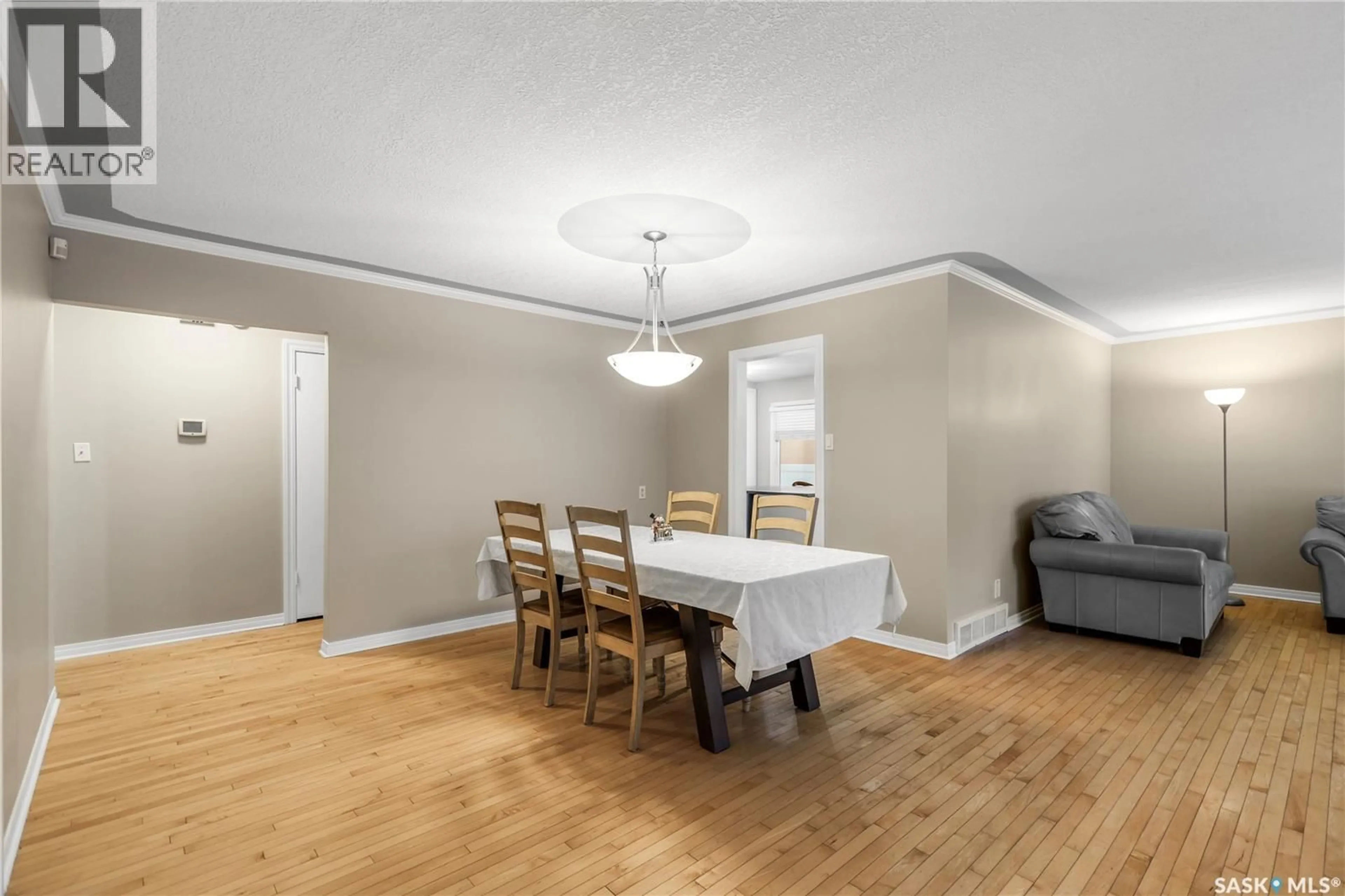 Dining room, wood/laminate floor for 311 HABKIRK DRIVE, Regina Saskatchewan S4S6A9