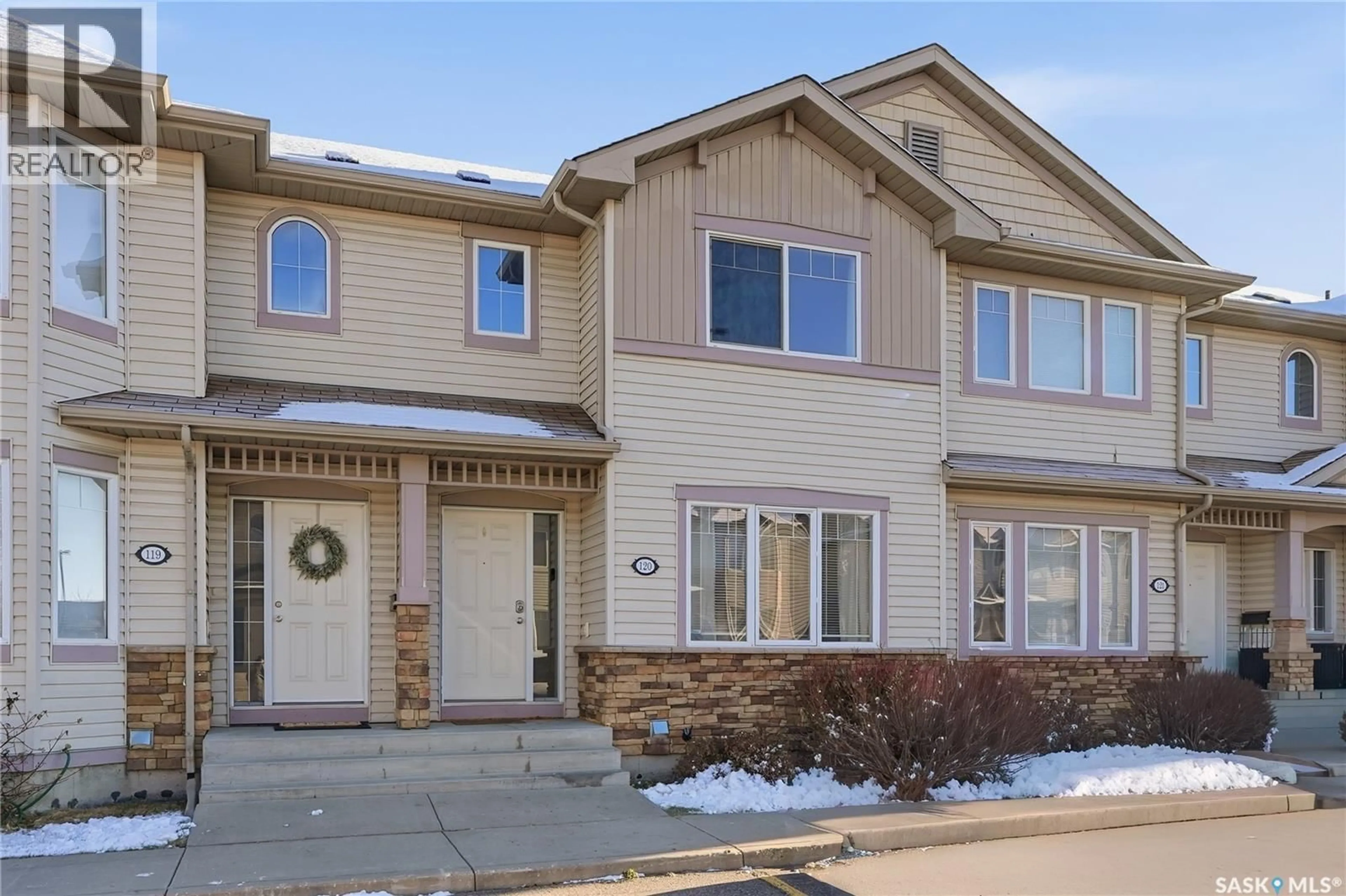 Home with vinyl exterior material, street for 120 303 SLIMMON PLACE, Saskatoon Saskatchewan S7V0A8