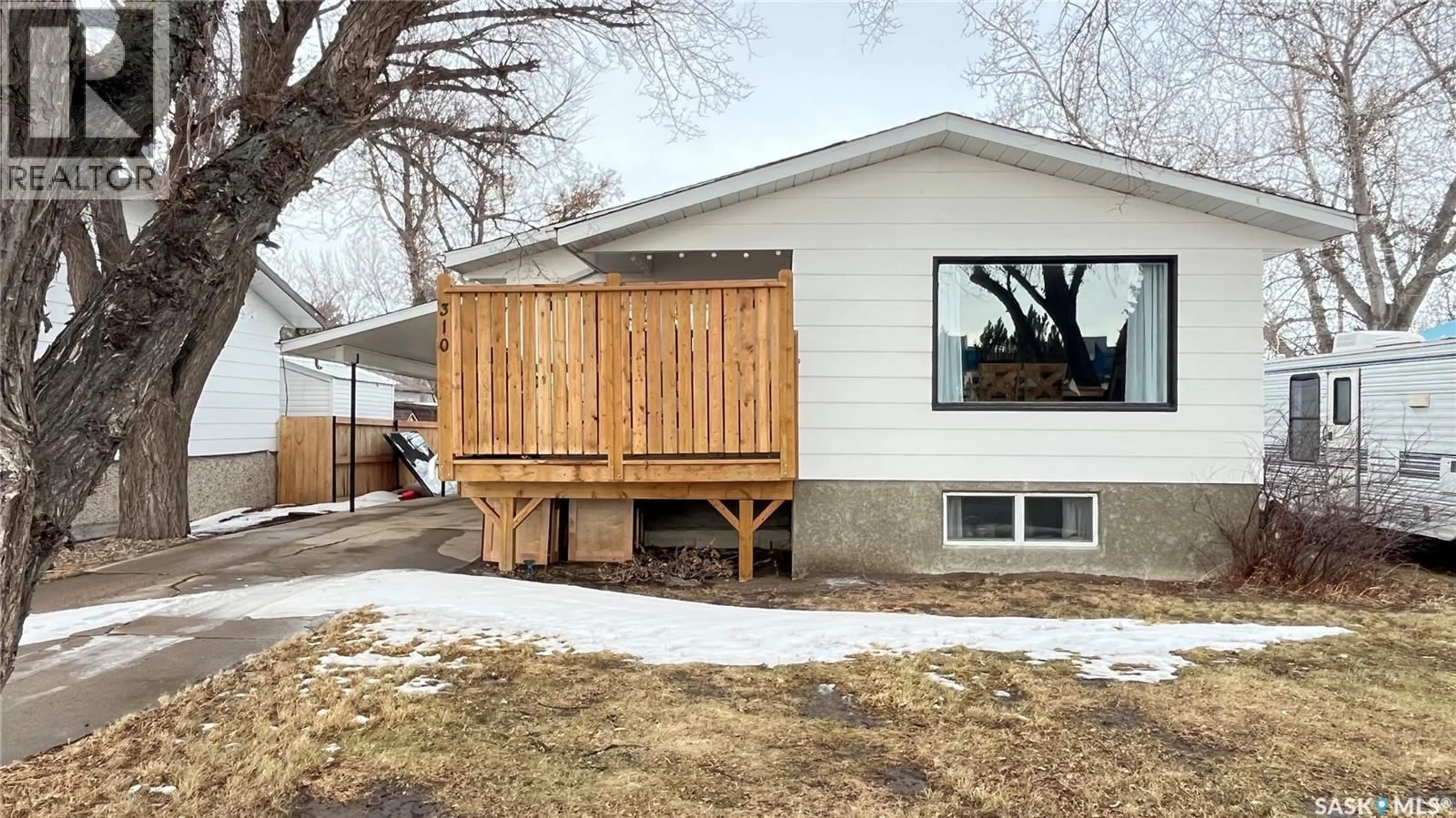 Home with vinyl exterior material, street for 310 LOUIS AVENUE, Maple Creek Saskatchewan S0N1N0