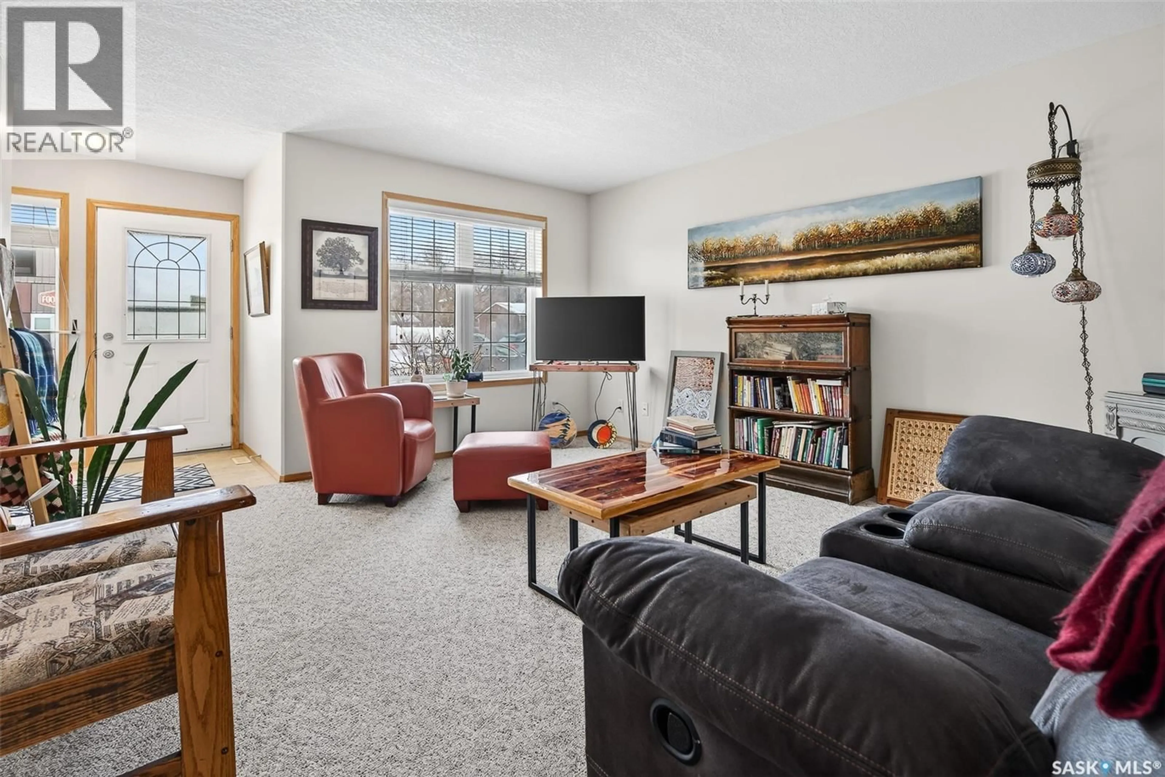 Living room with furniture, unknown for 4 257 FAIRFORD STREET W, Moose Jaw Saskatchewan S6H1V5