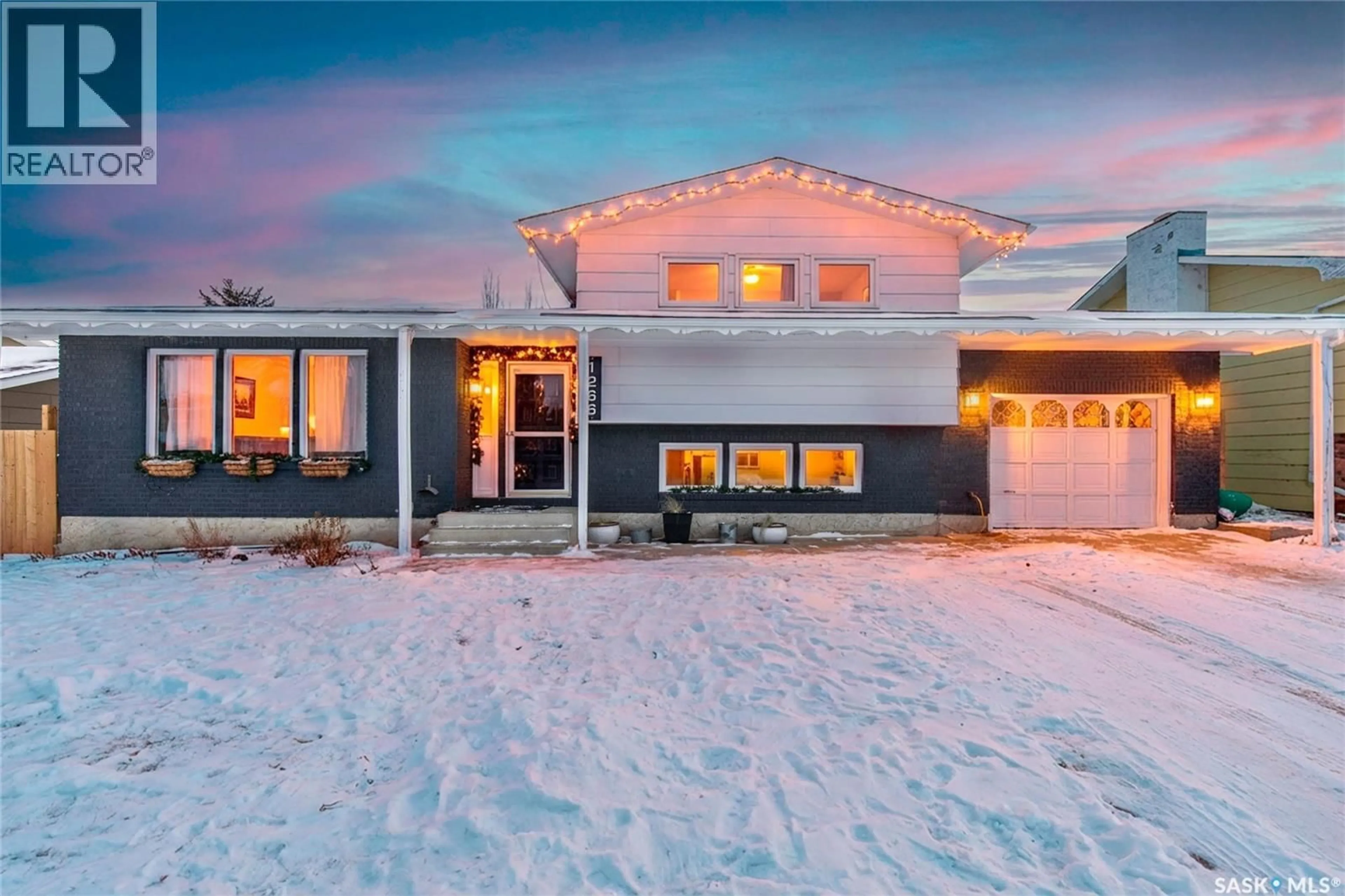 Home with vinyl exterior material, street for 1266 MAYBERRY CRESCENT, Moose Jaw Saskatchewan S6H7B4