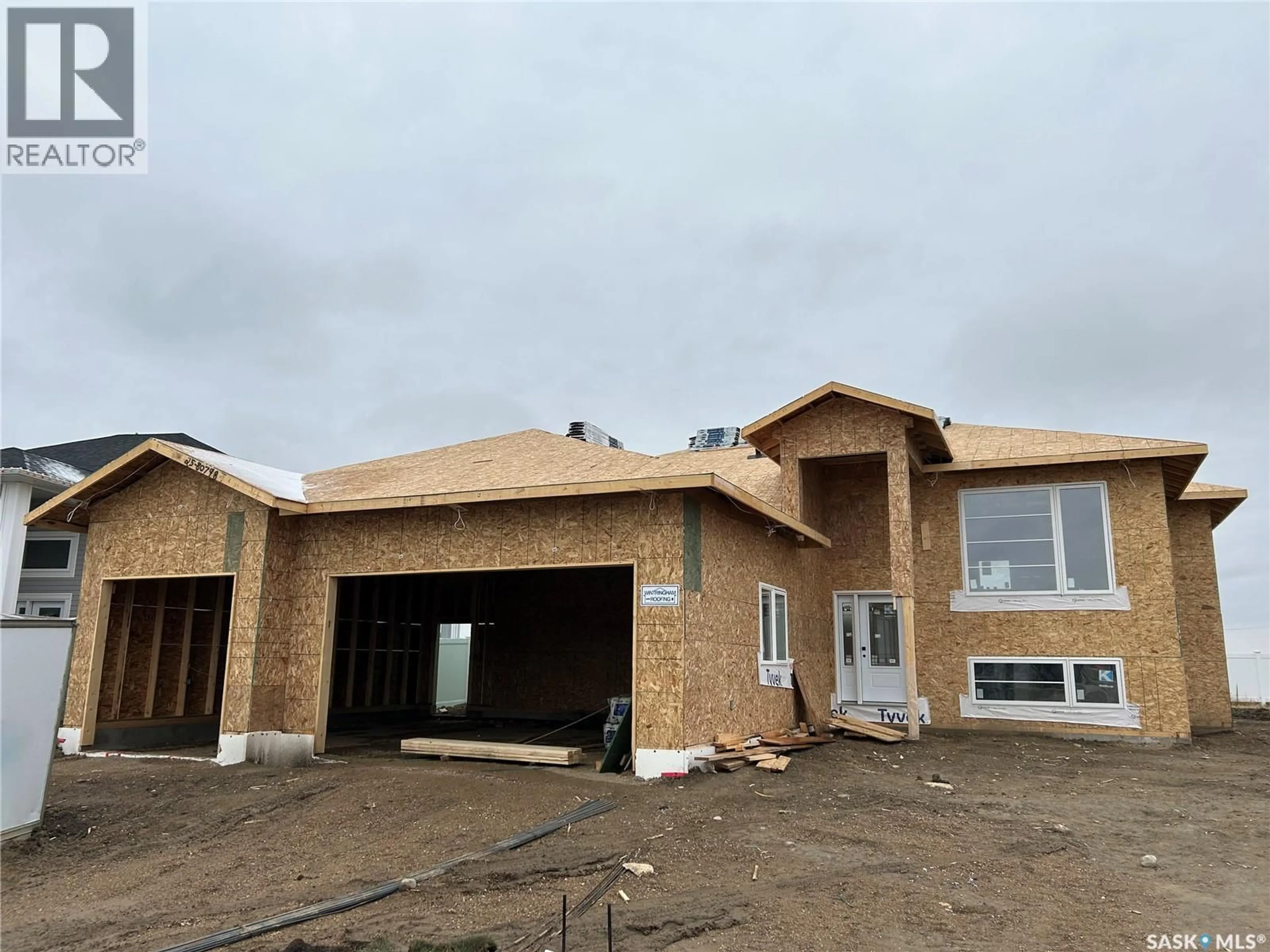 Home with brick exterior material, building for 812 WOODS CRESCENT, Warman Saskatchewan S0K4S4