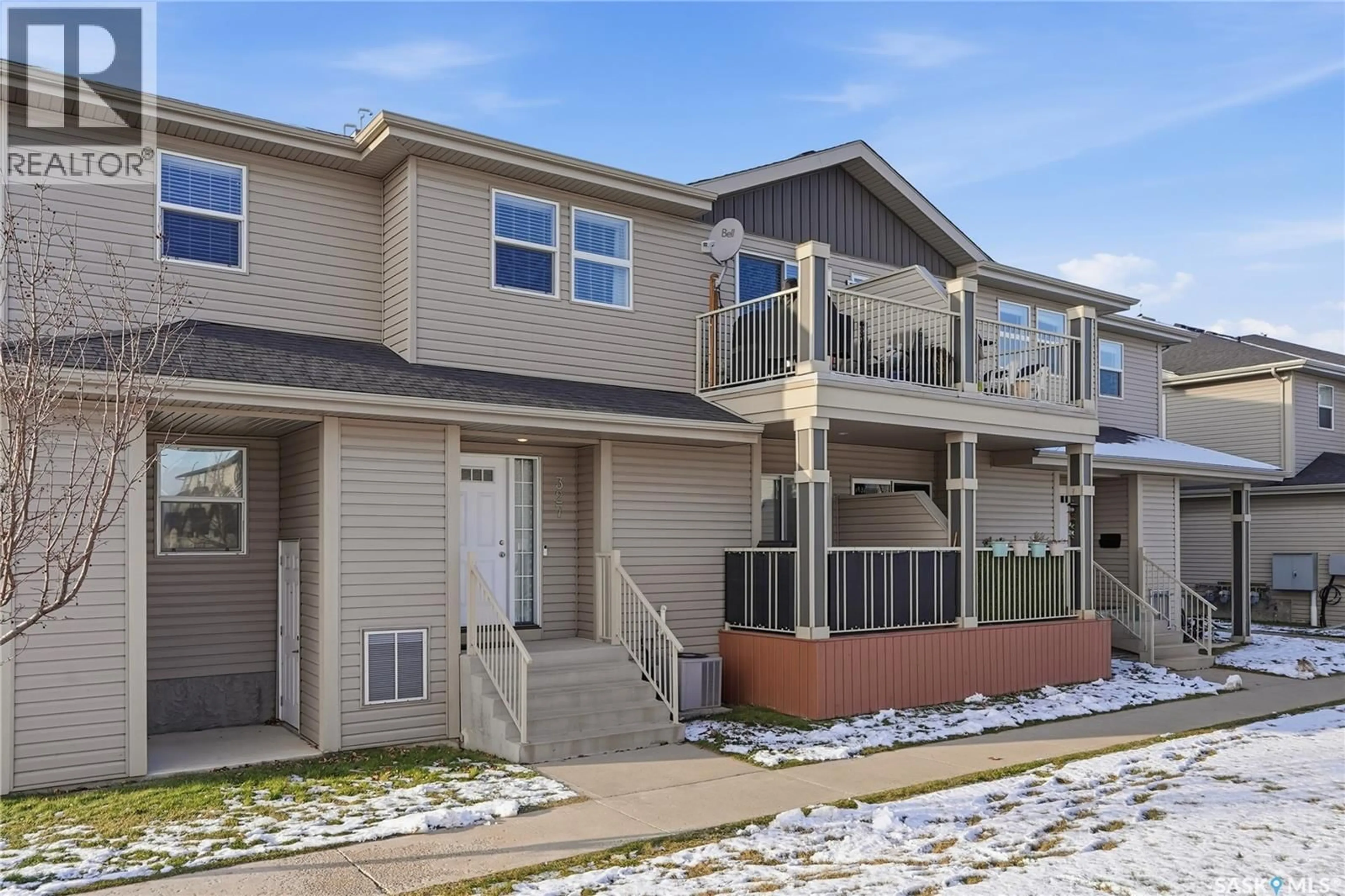 Home with vinyl exterior material, street for 327 100 CHAPARRAL BOULEVARD, Martensville Saskatchewan S0K0A2