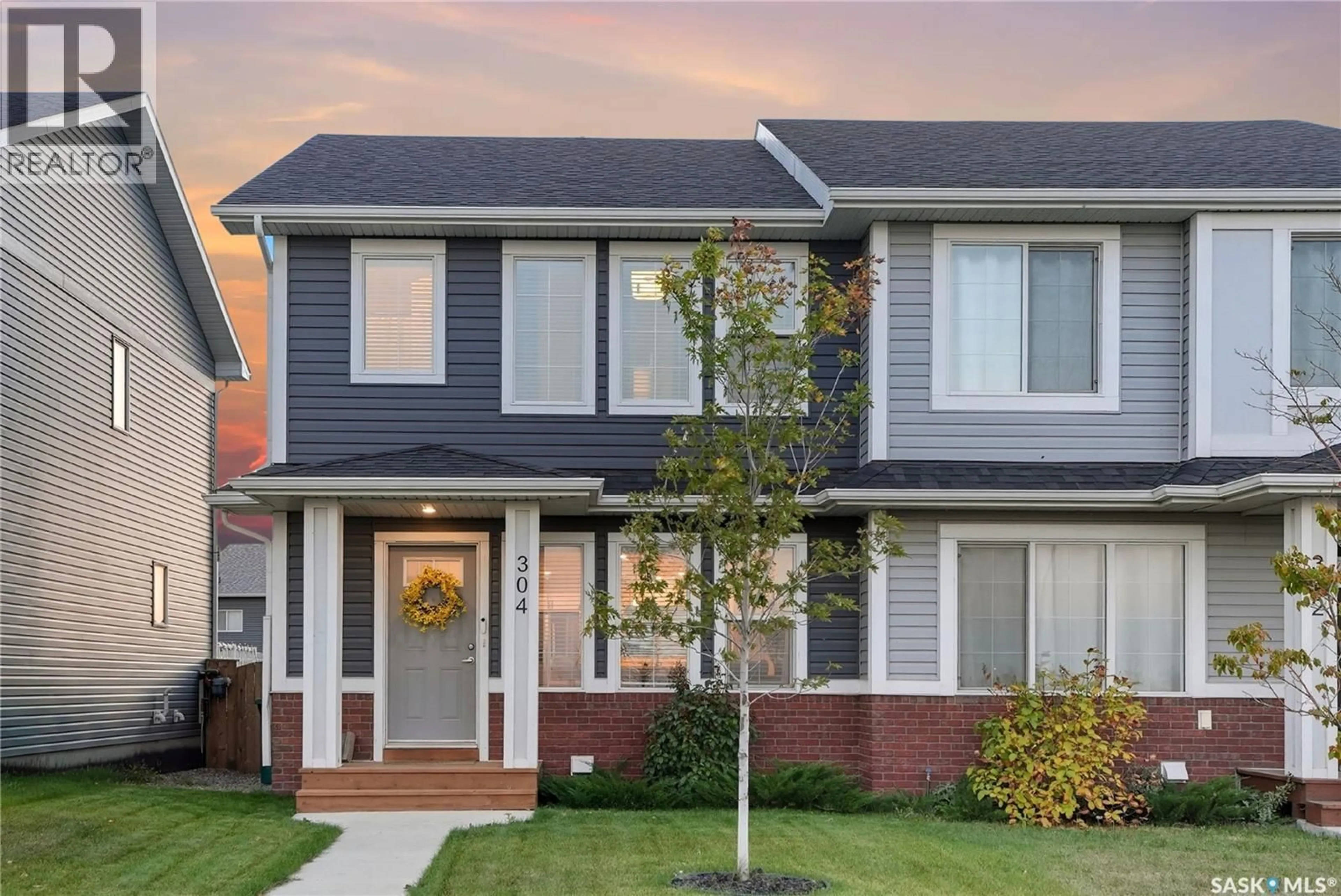 Home with brick exterior material, street for 304 MCORMOND DRIVE, Saskatoon Saskatchewan S7V0W9