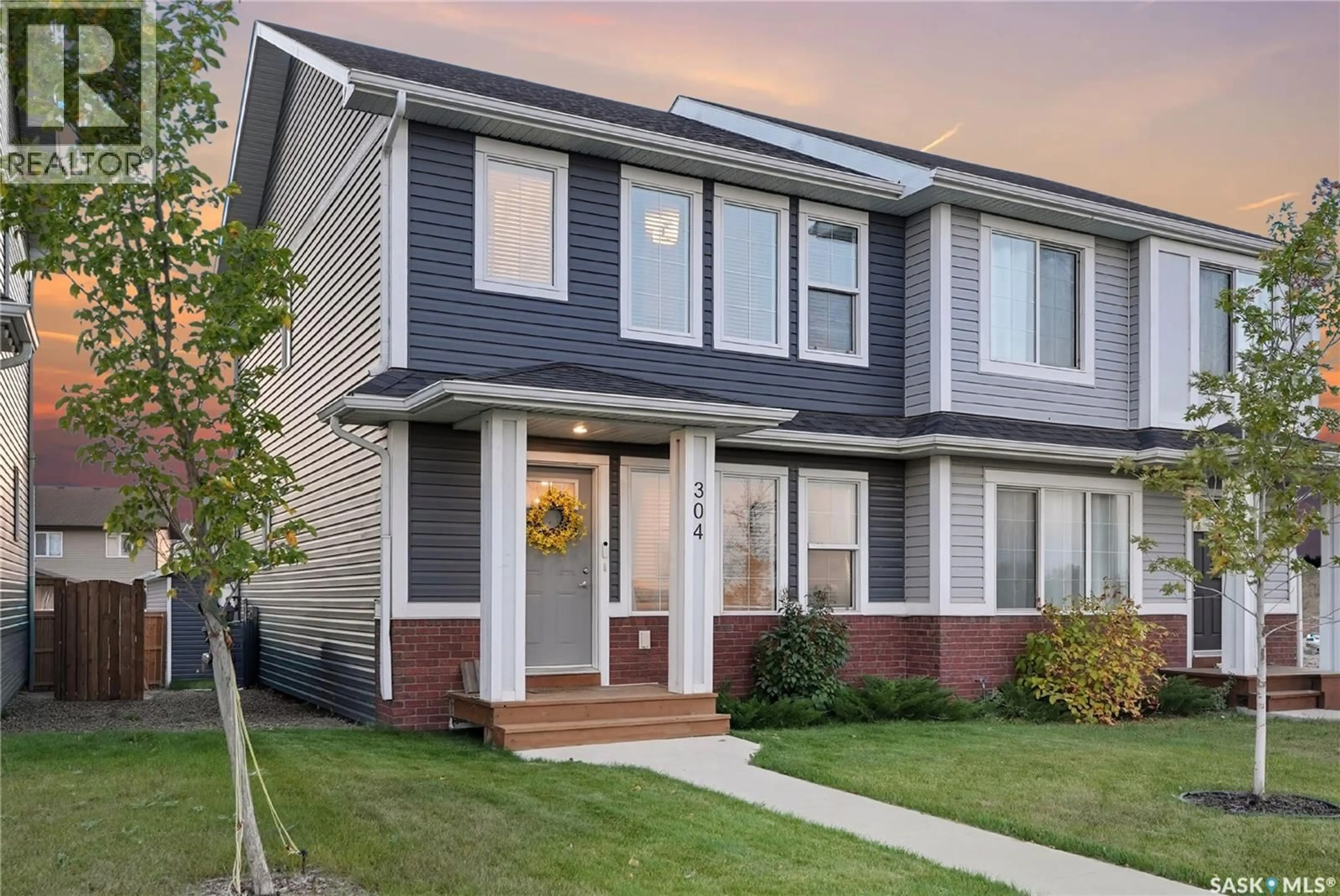 Home with vinyl exterior material, street for 304 MCORMOND DRIVE, Saskatoon Saskatchewan S7V0W9