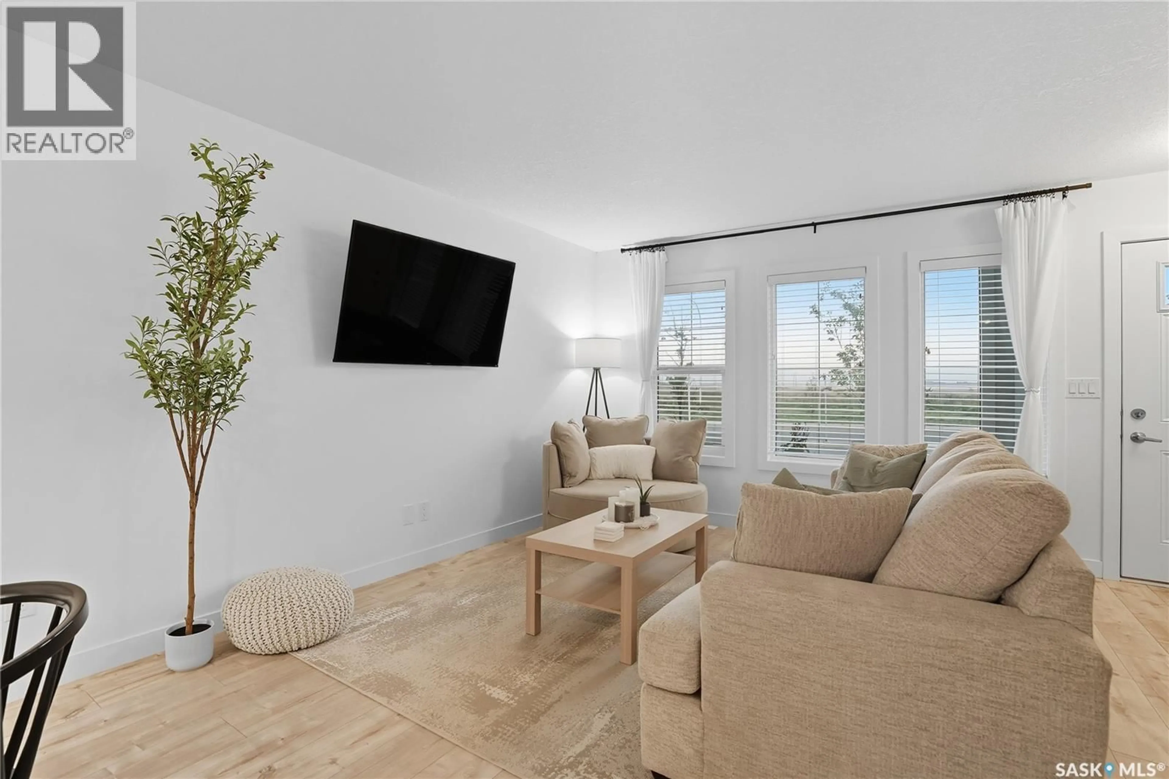 Living room with furniture, unknown for 304 MCORMOND DRIVE, Saskatoon Saskatchewan S7V0W9