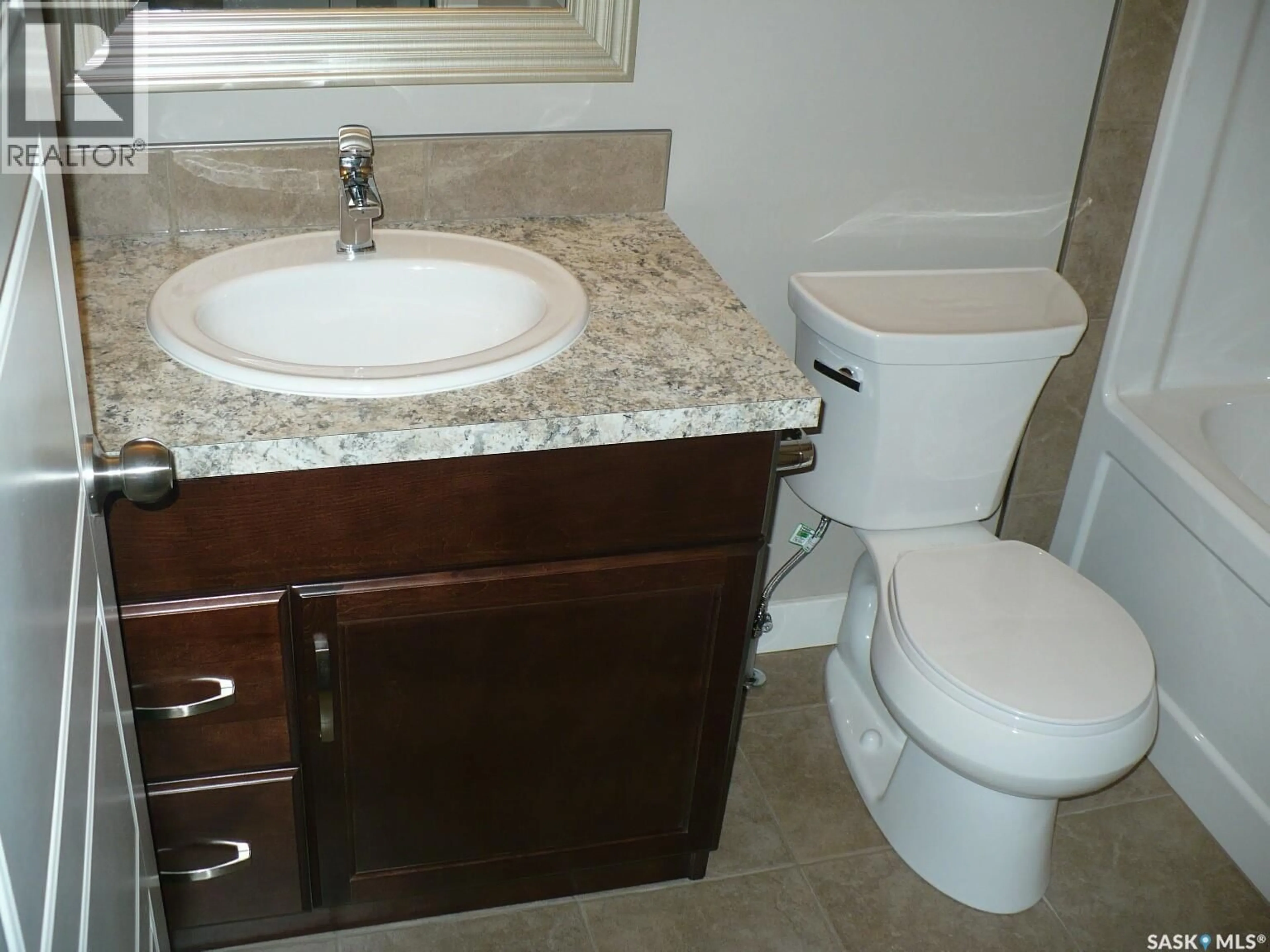 Standard bathroom, ceramic/tile floor for 2237 MCARA STREET, Regina Saskatchewan S4N2W2
