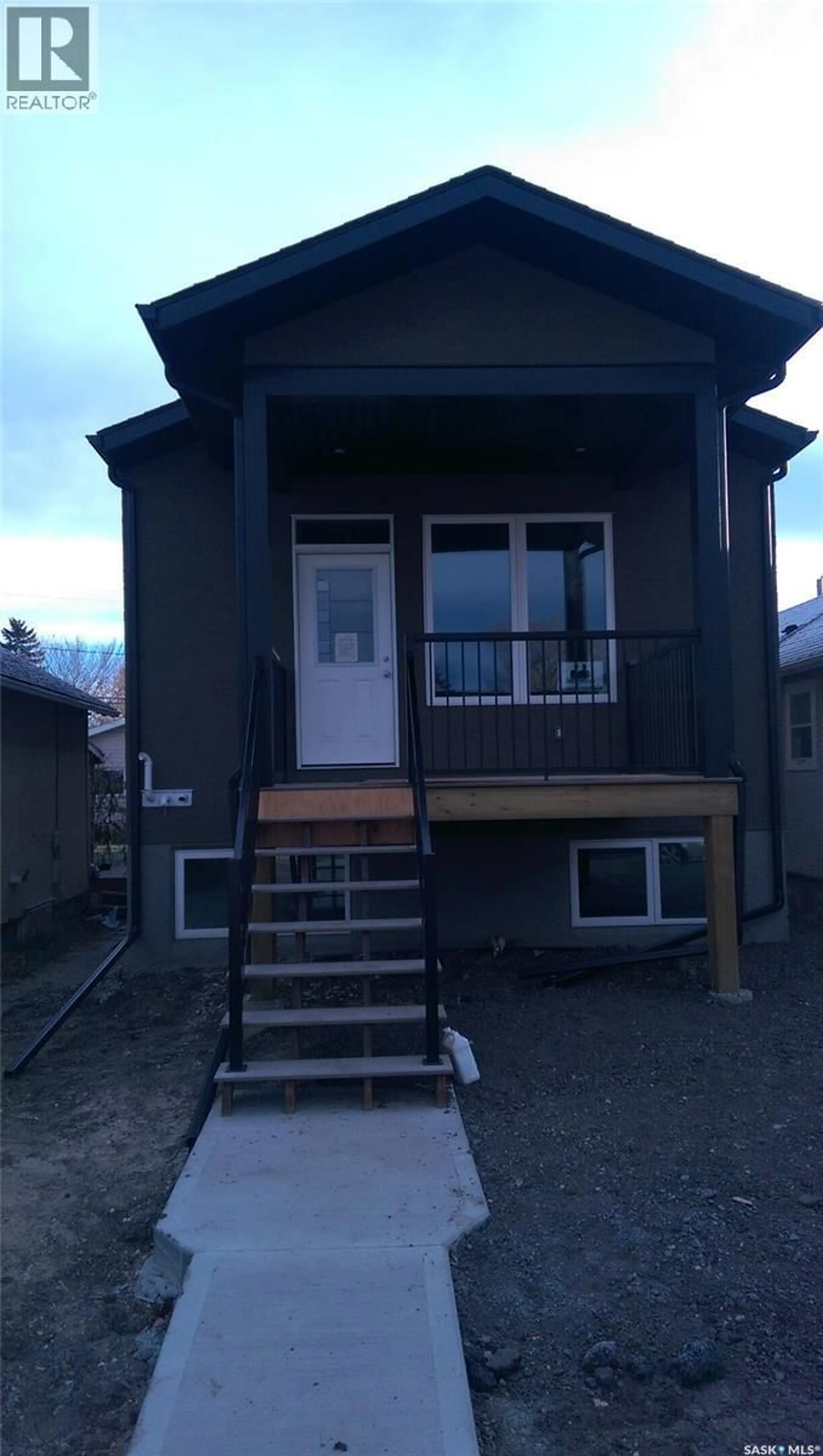 Home with vinyl exterior material, street for 2237 MCARA STREET, Regina Saskatchewan S4N2W2