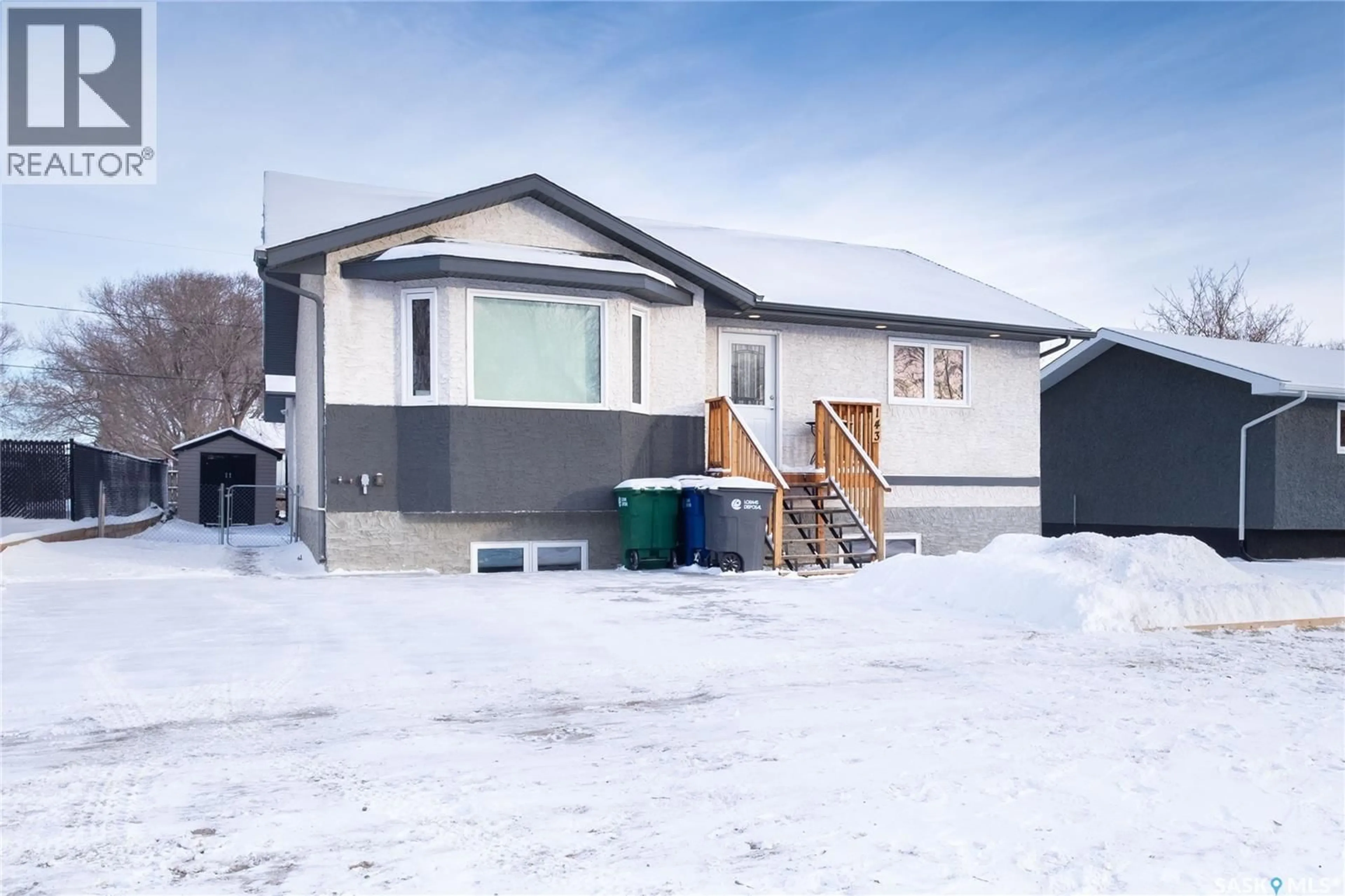 Home with vinyl exterior material, street for 143 6TH STREET, Pilot Butte Saskatchewan S0G3Z0