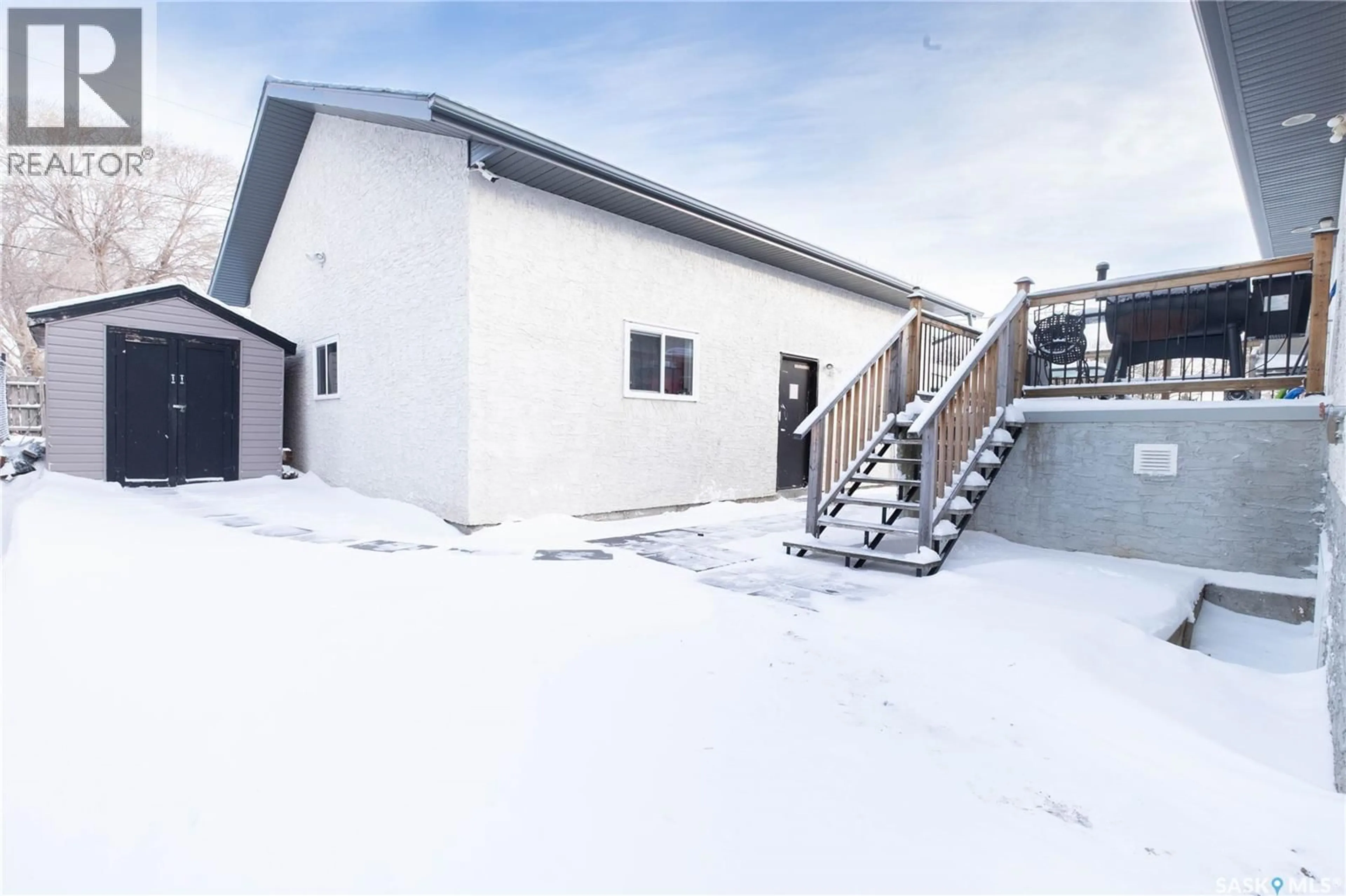 A pic from outside/outdoor area/front of a property/back of a property/a pic from drone, building for 143 6TH STREET, Pilot Butte Saskatchewan S0G3Z0