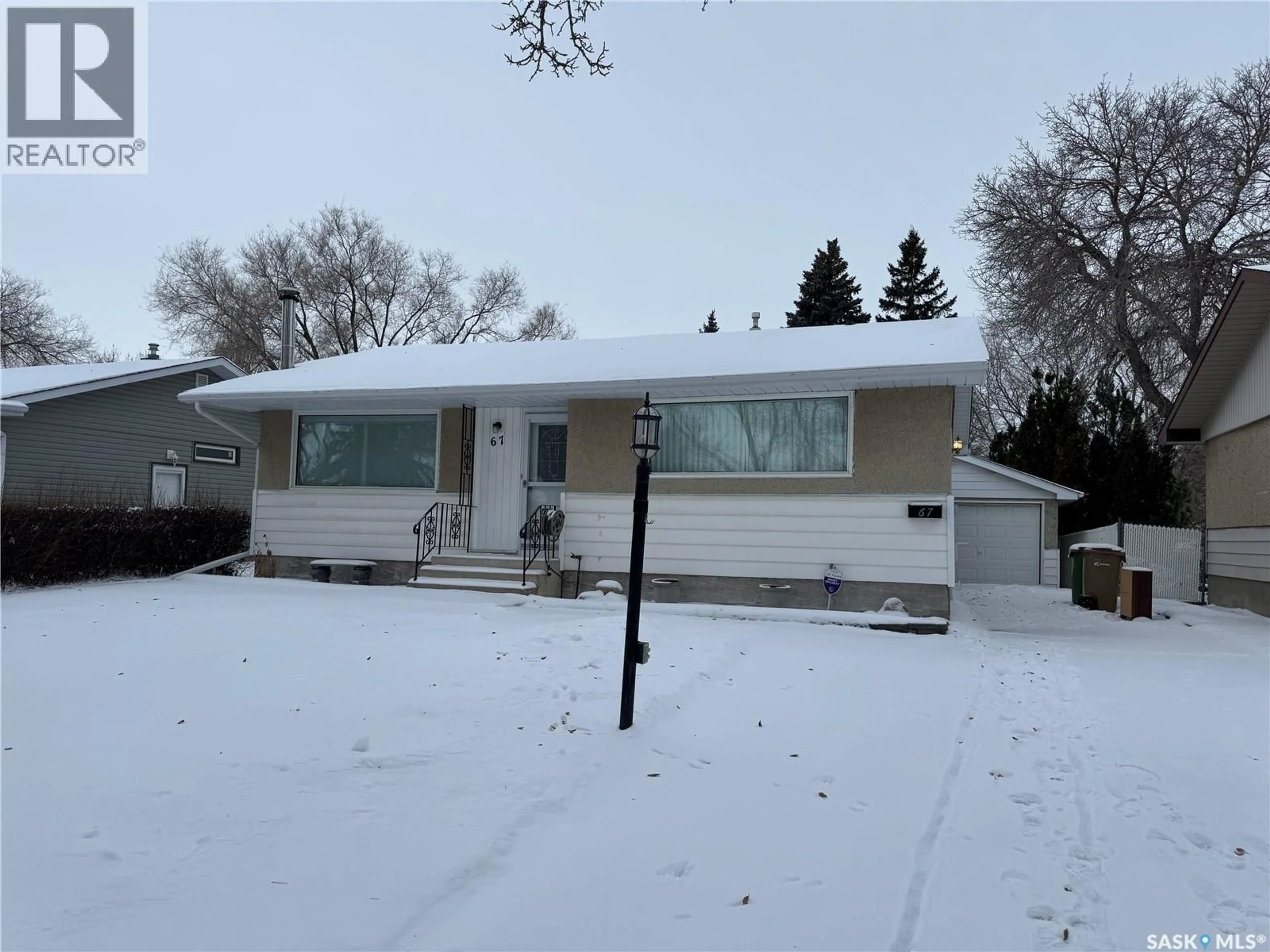 Home with vinyl exterior material, street for 67 MILFORD CRESCENT, Regina Saskatchewan S4N1K6