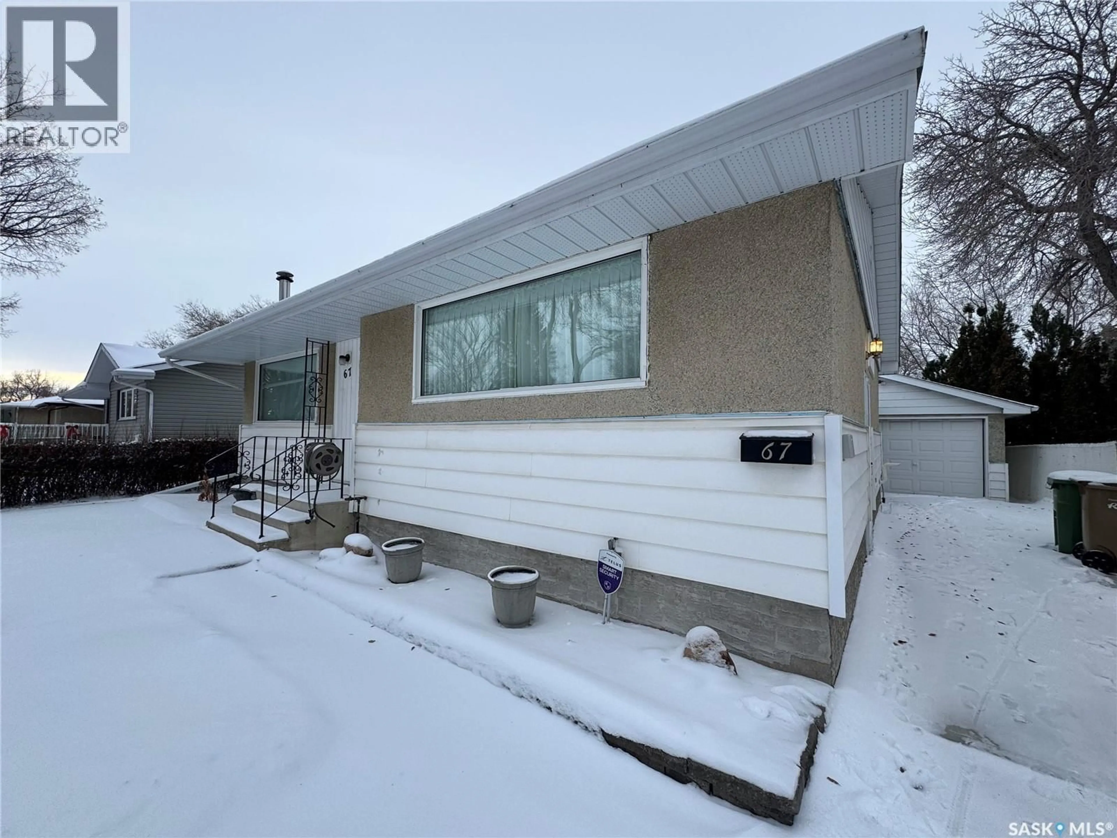 Home with vinyl exterior material, street for 67 MILFORD CRESCENT, Regina Saskatchewan S4N1K6
