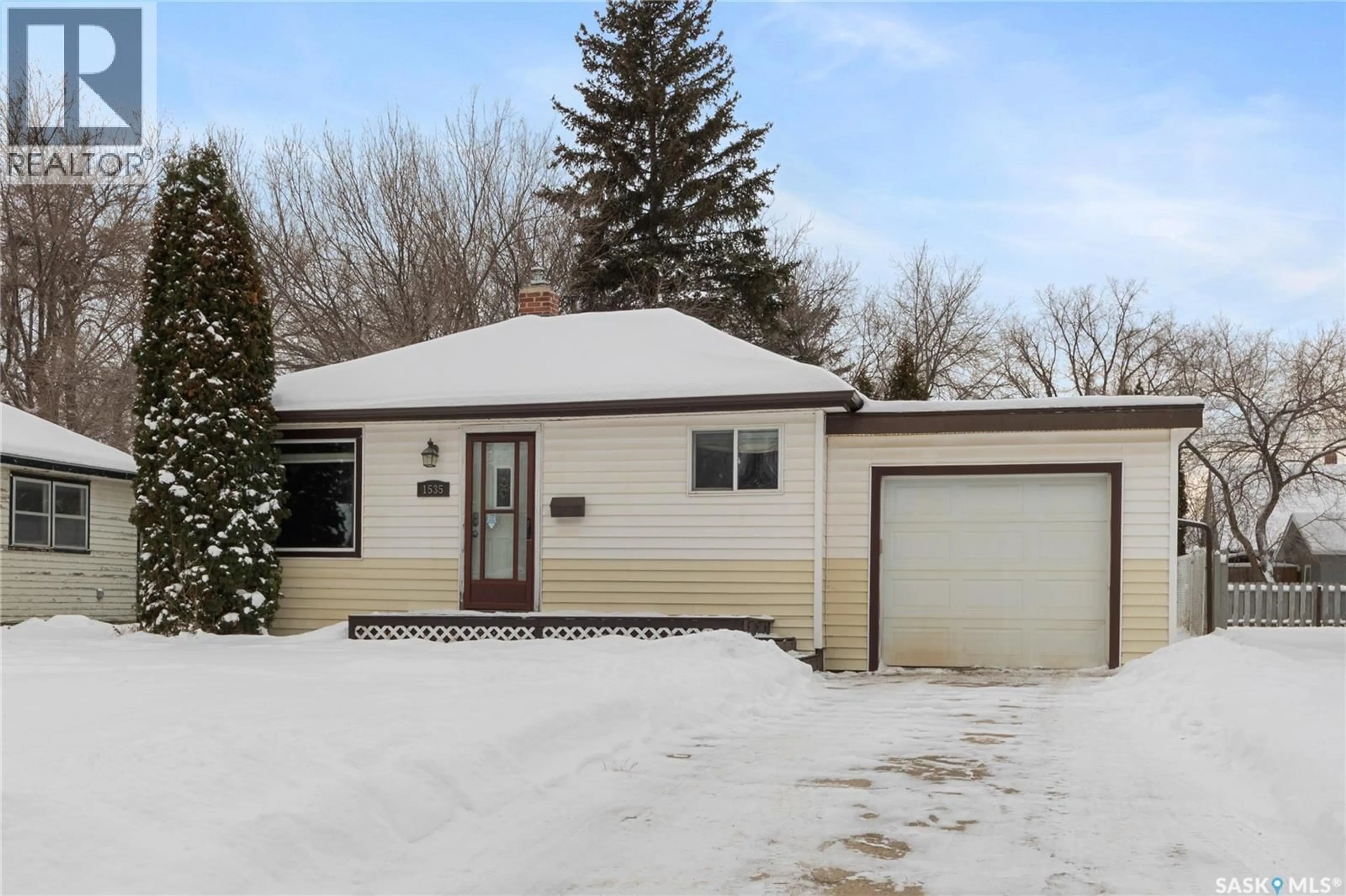 Home with vinyl exterior material, street for 1535 2ND AVENUE, Saskatoon Saskatchewan S7K2E9