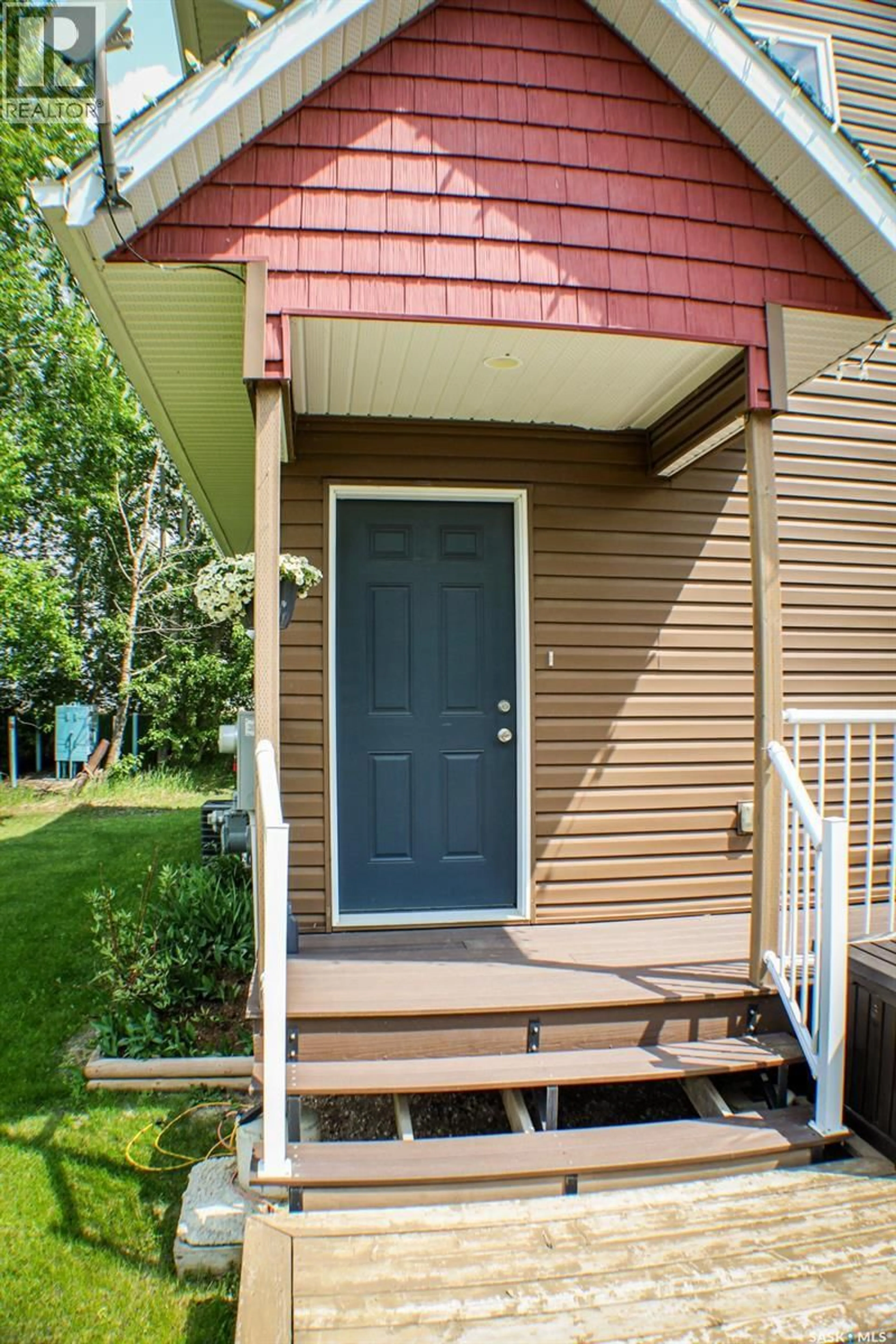 Home with vinyl exterior material, street for 110 BAILLIE ROAD, Willow Creek Rm No. 458 Saskatchewan S0E0T0