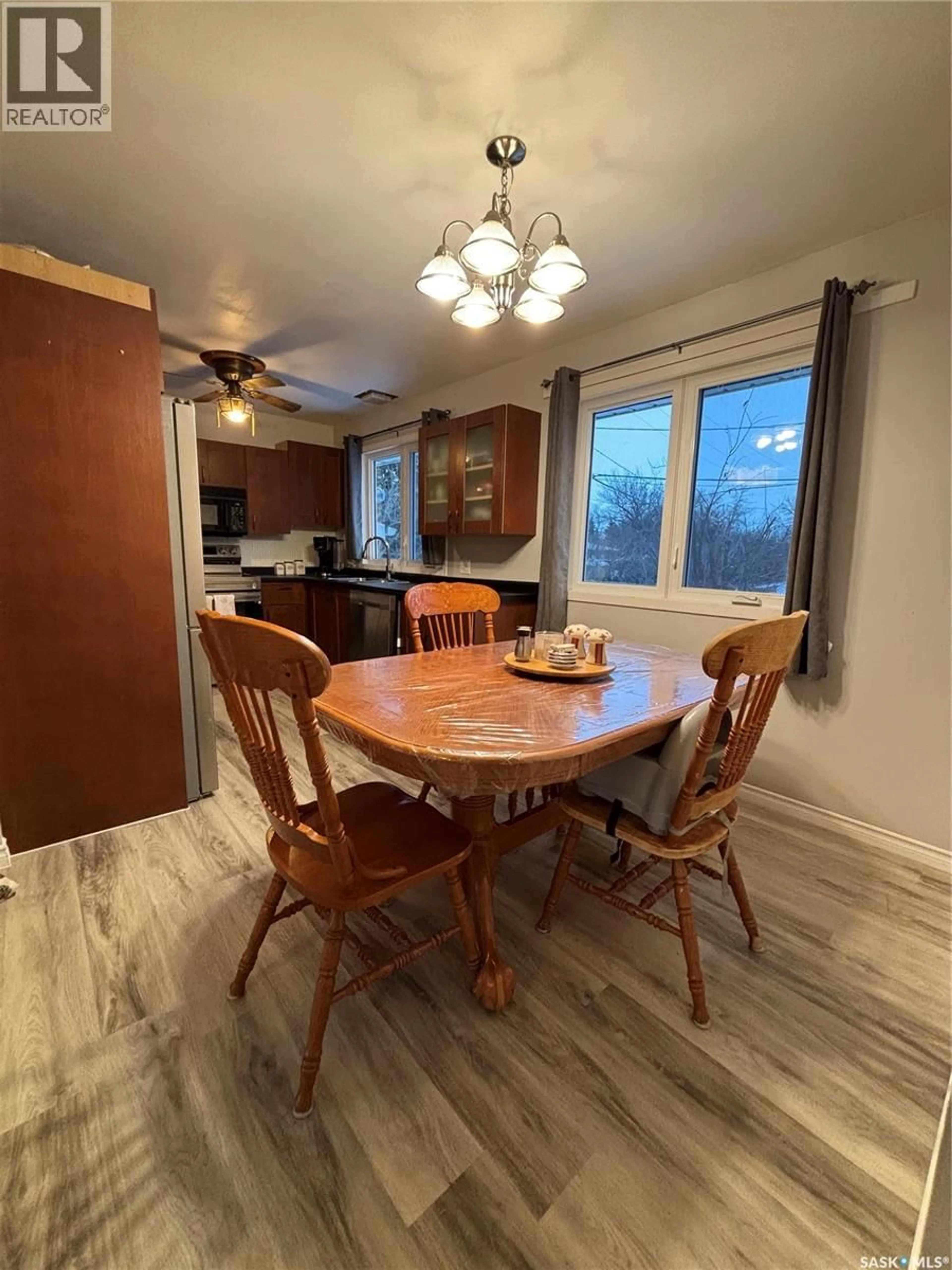 Dining room, wood/laminate floor for 114 JUBILEE CRESCENT, Canora Saskatchewan S0A0L0