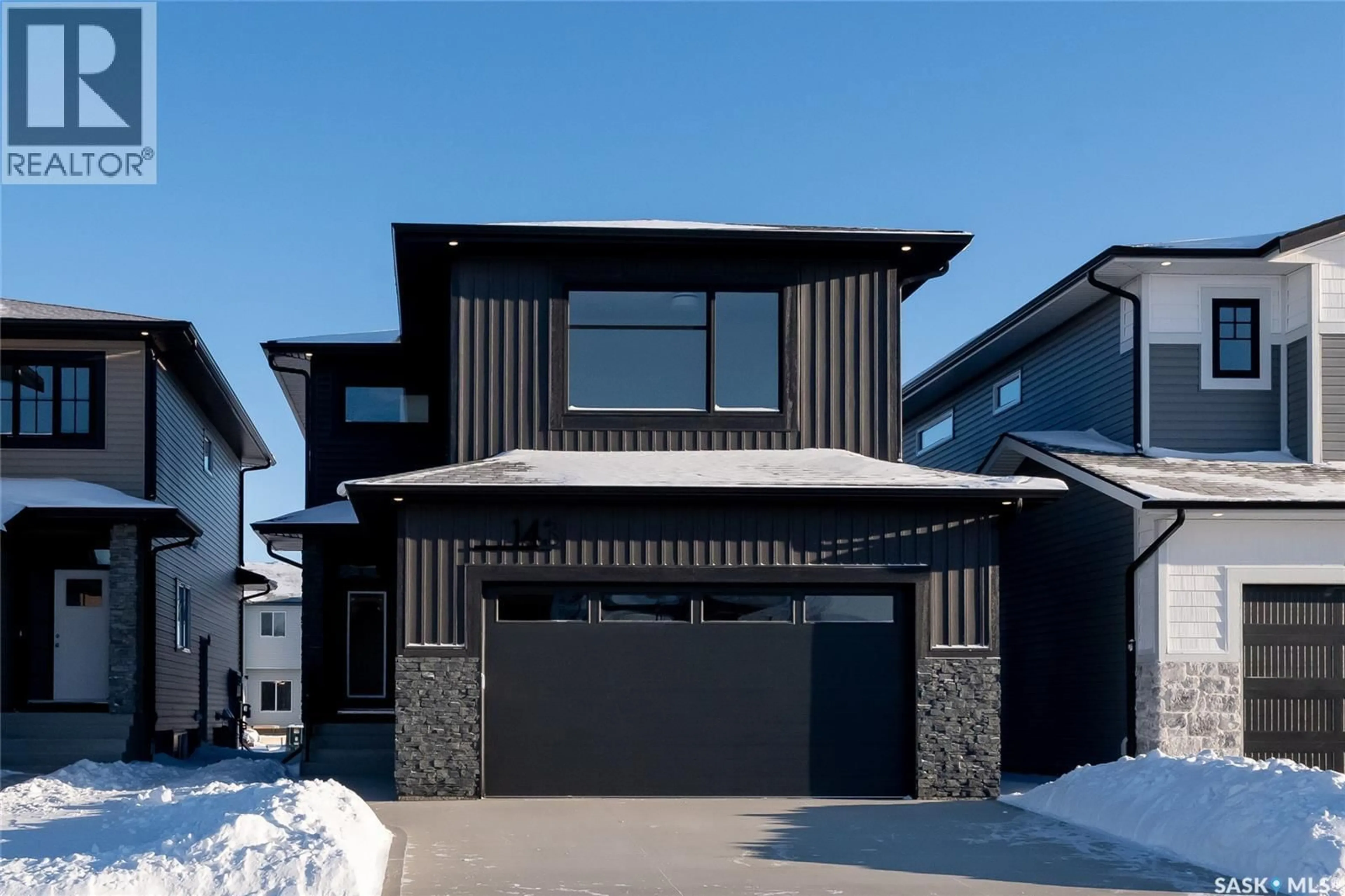 Home with brick exterior material, street for 143 COCKROFT MANOR, Saskatoon Saskatchewan S7V1Y4