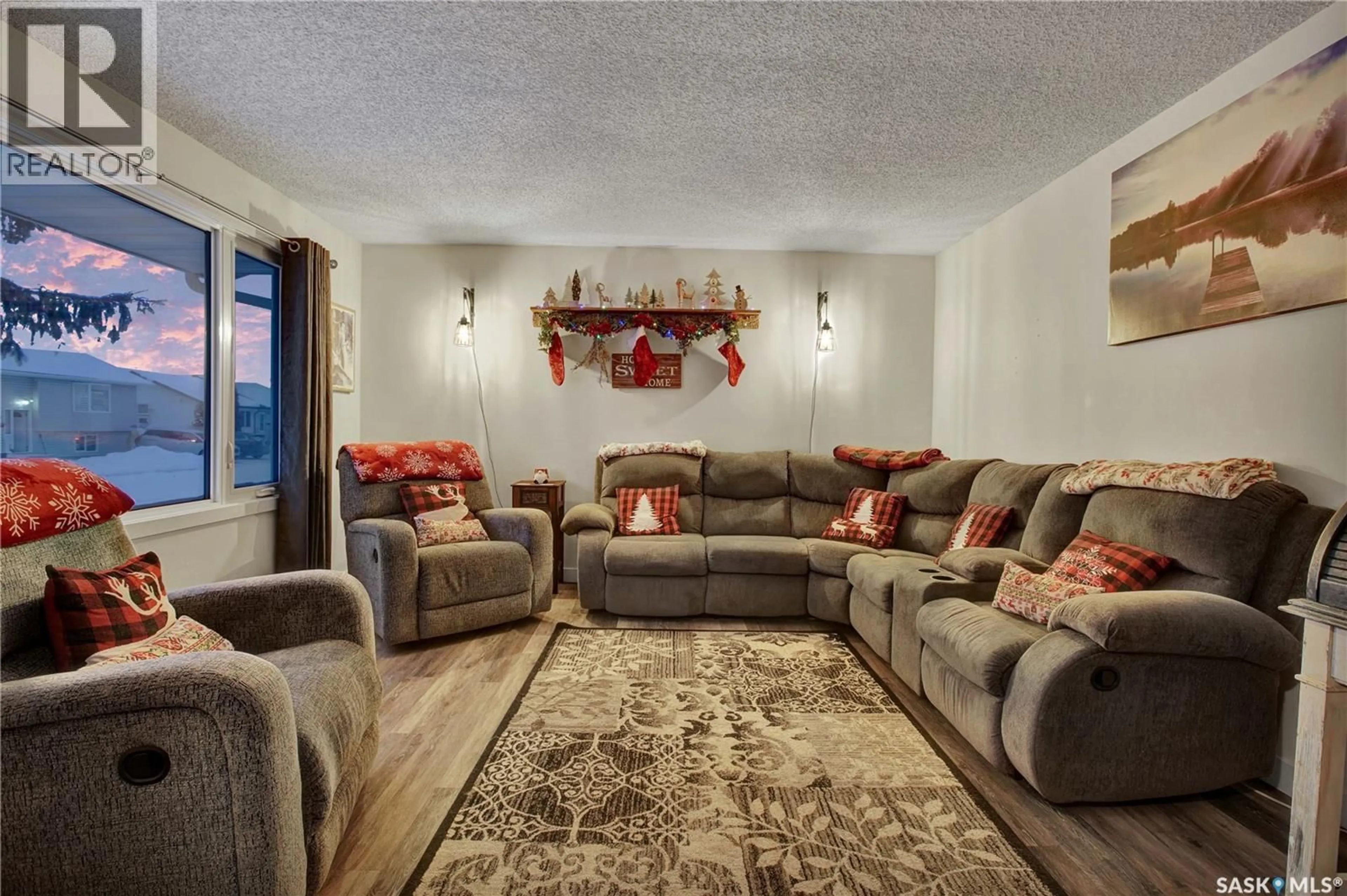 Living room with furniture, carpet floor for 212 2ND AVENUE, Warman Saskatchewan S0K4S0