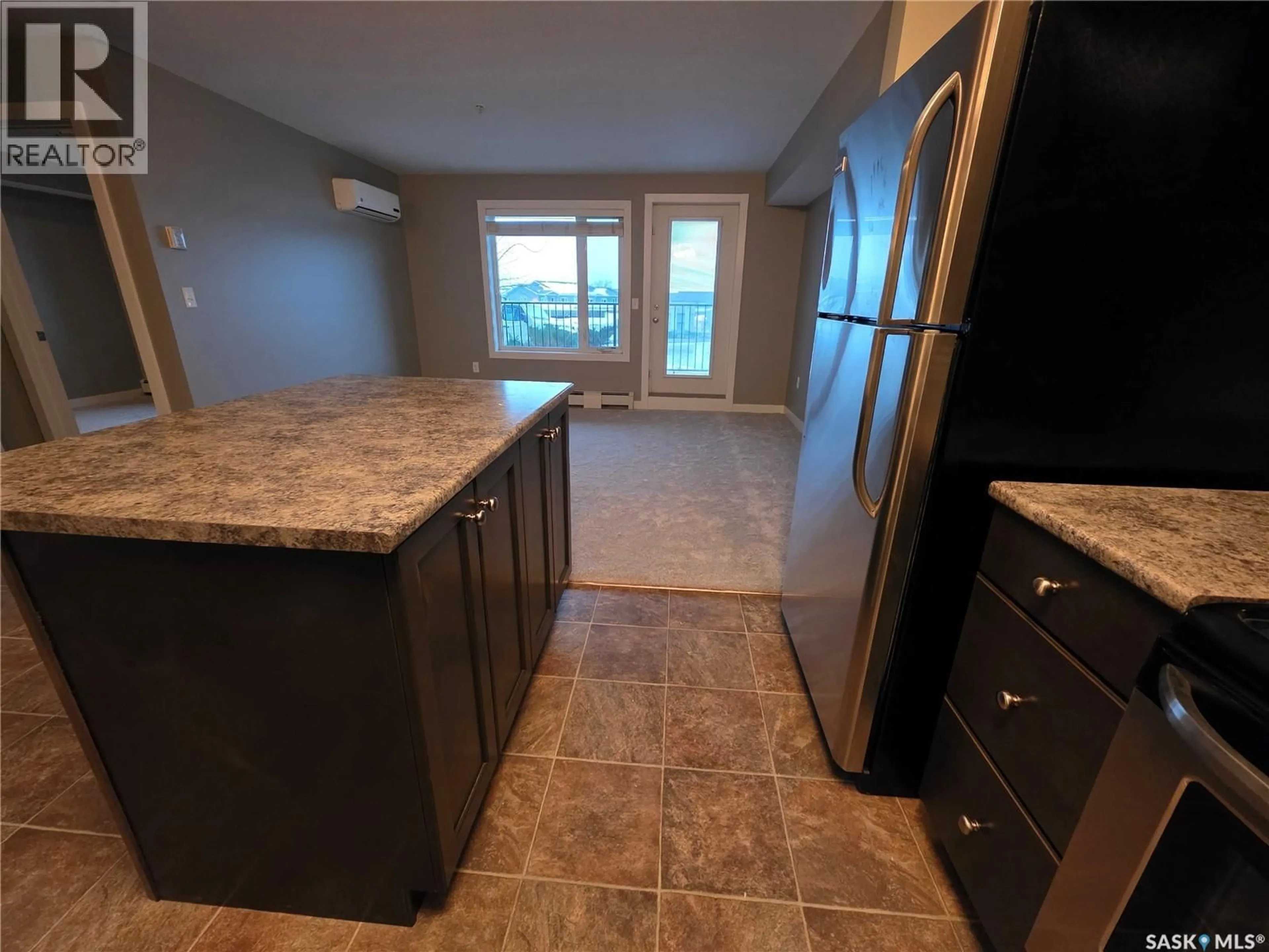 Open concept kitchen, unknown for 103 - 2141 LARTER ROAD, Estevan Saskatchewan S4A2Y5