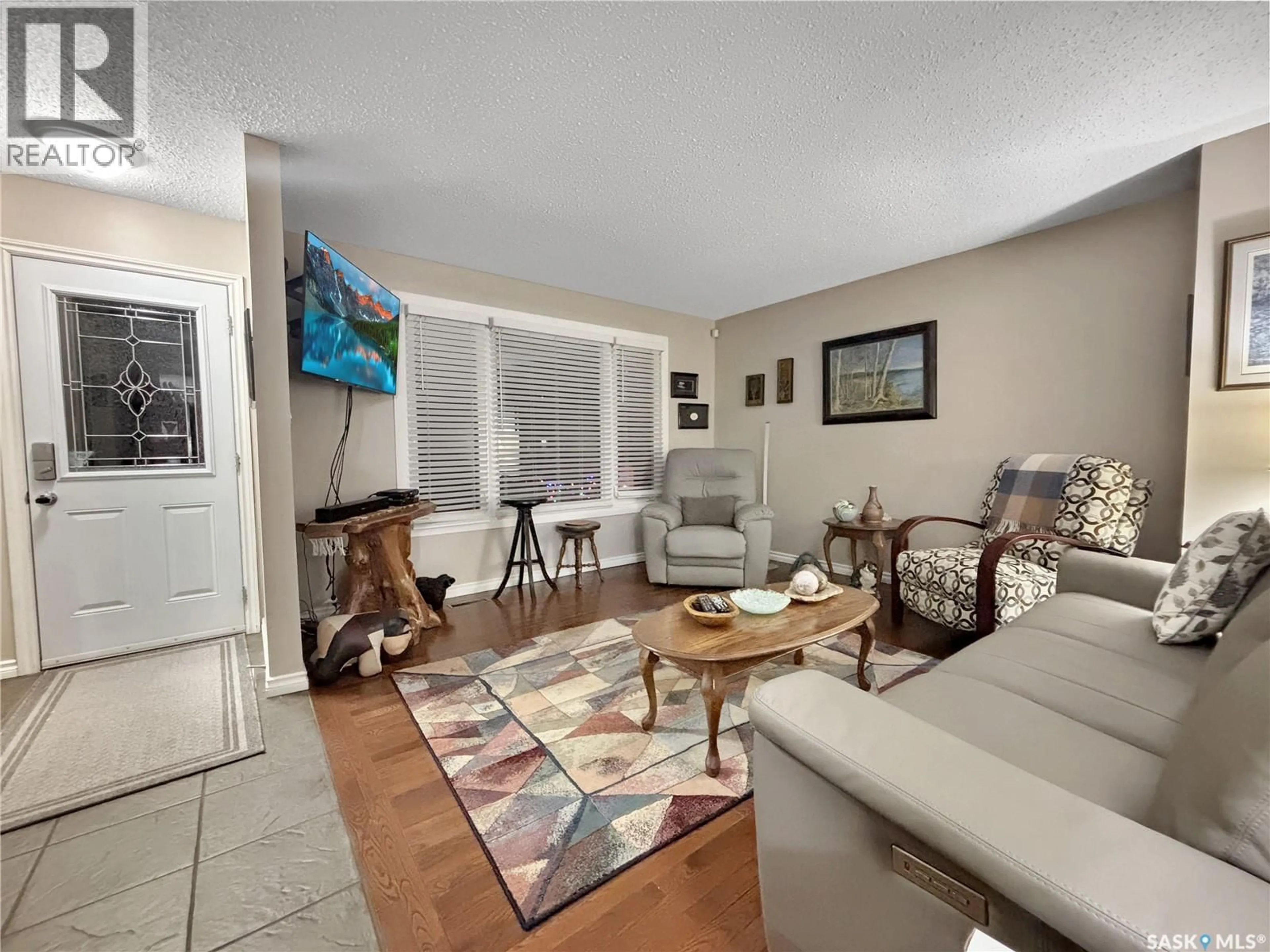 Living room with furniture, unknown for 2004 FOLEY DRIVE, North Battleford Saskatchewan S9A3G9