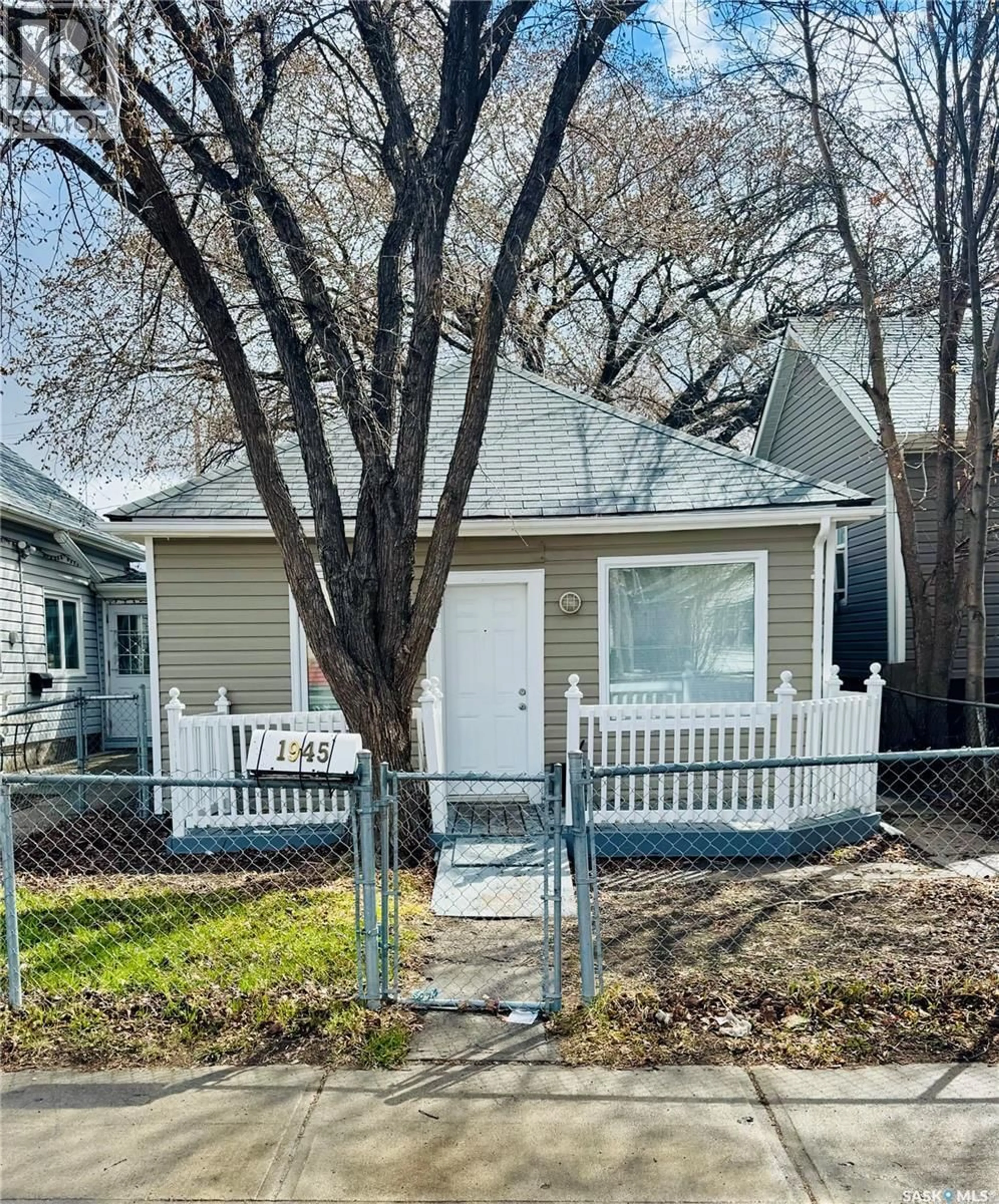 Home with vinyl exterior material, street for 1945 WALLACE STREET, Regina Saskatchewan S4N4A1