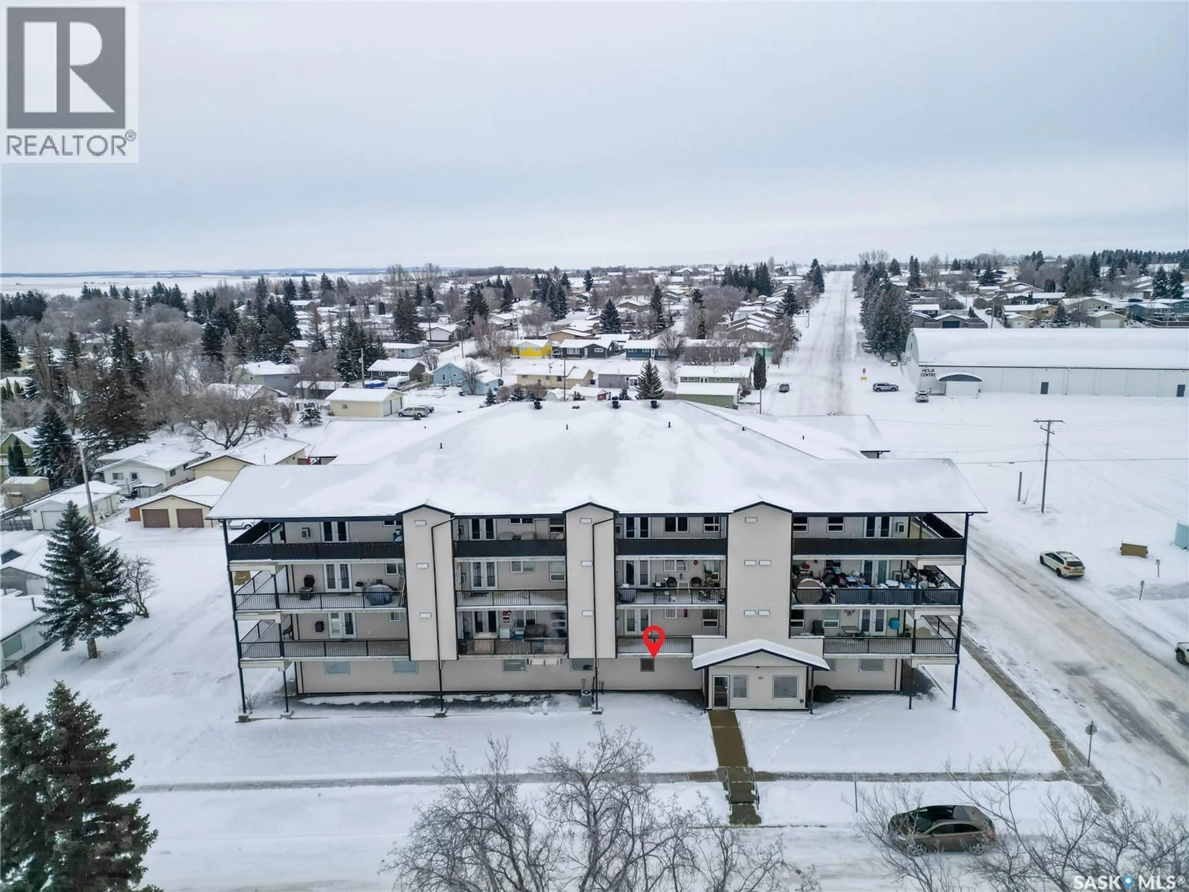 A pic from outside/outdoor area/front of a property/back of a property/a pic from drone, city buildings view from balcony for 201 220 MCCALLUM AVENUE, Birch Hills Saskatchewan S0J0G0
