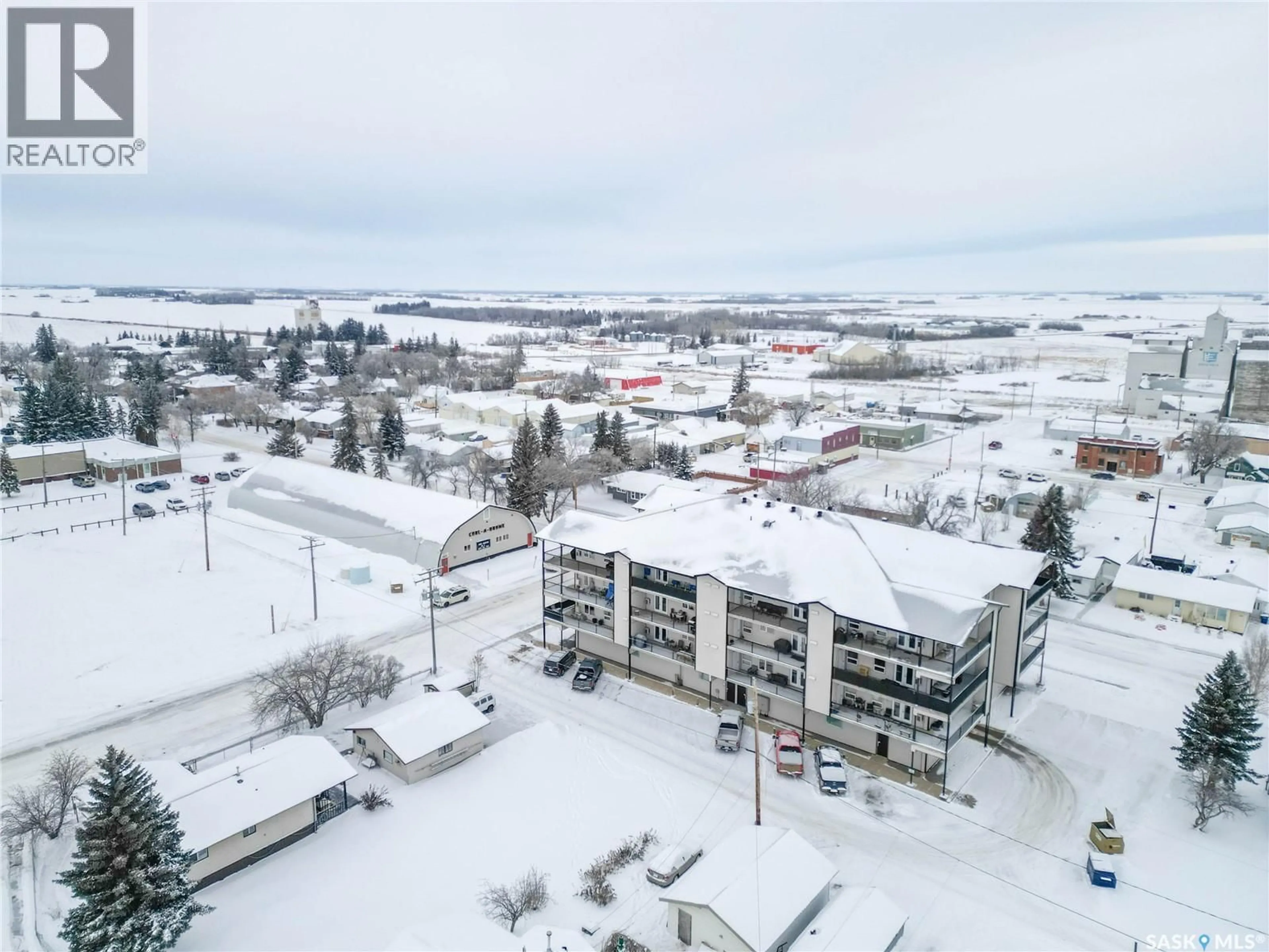 A pic from outside/outdoor area/front of a property/back of a property/a pic from drone, unknown for 201 220 MCCALLUM AVENUE, Birch Hills Saskatchewan S0J0G0