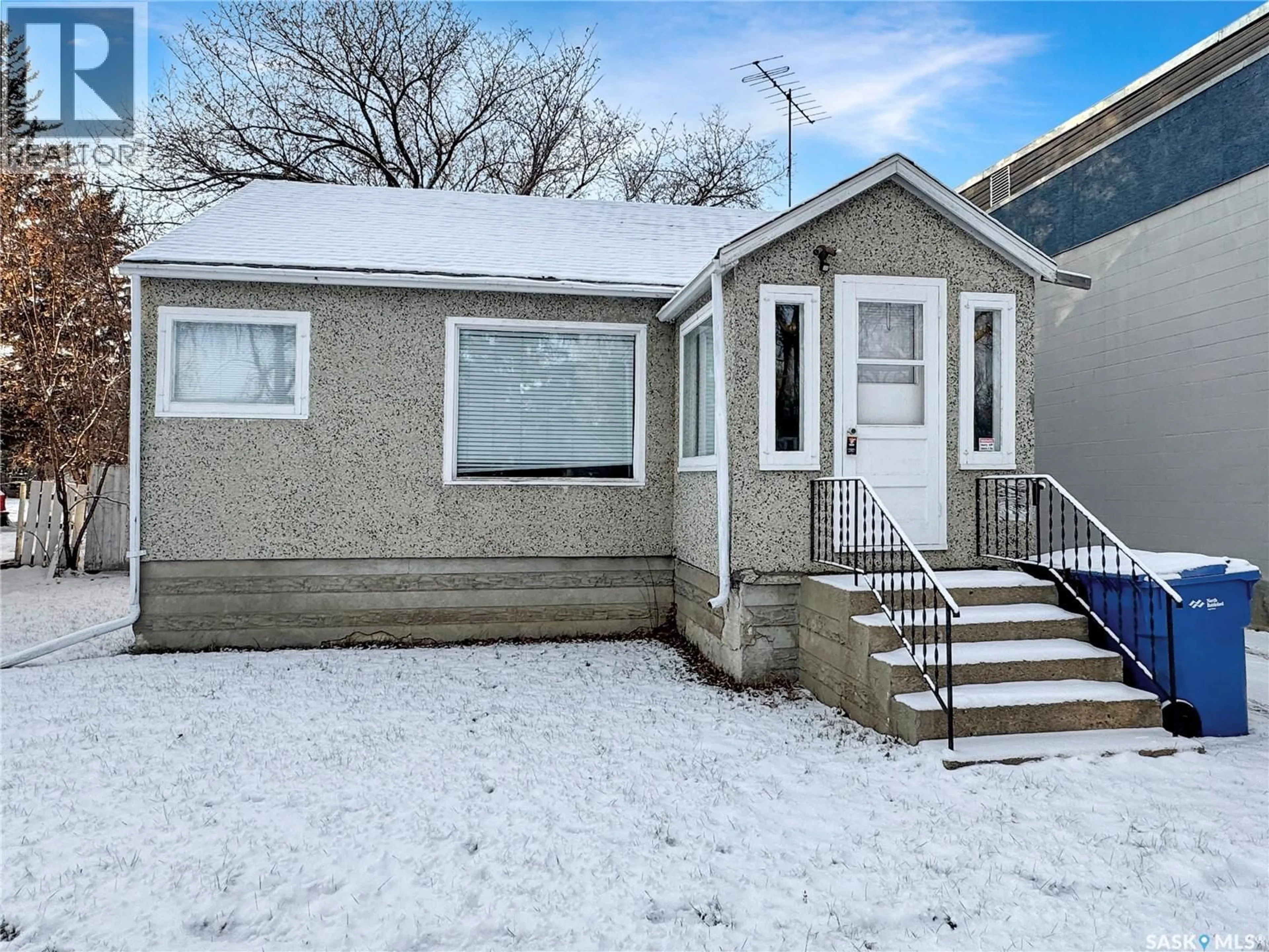 Home with vinyl exterior material, street for 1341 103RD STREET, North Battleford Saskatchewan S9A1K9