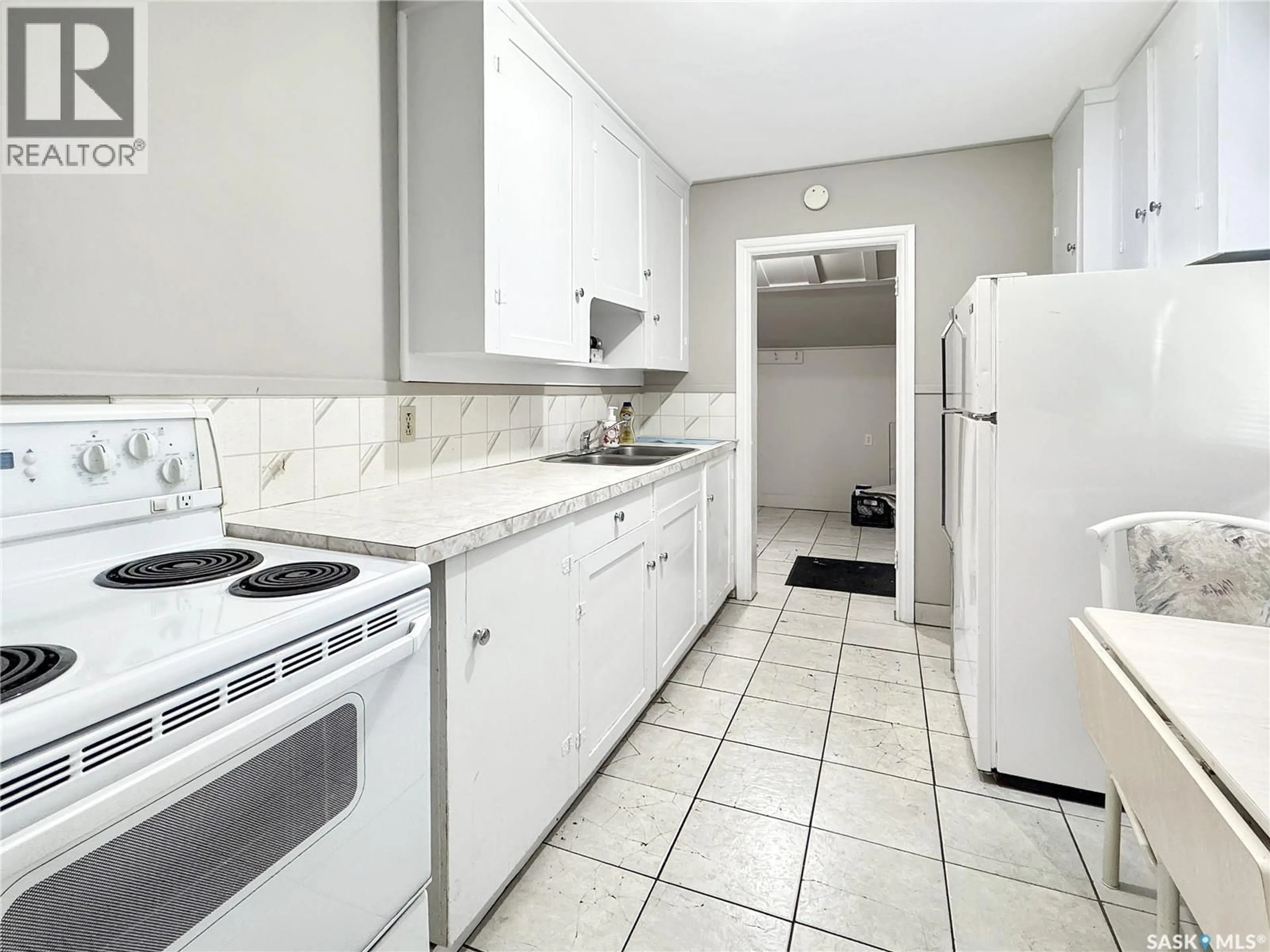 Standard kitchen, ceramic/tile floor for 1341 103RD STREET, North Battleford Saskatchewan S9A1K9