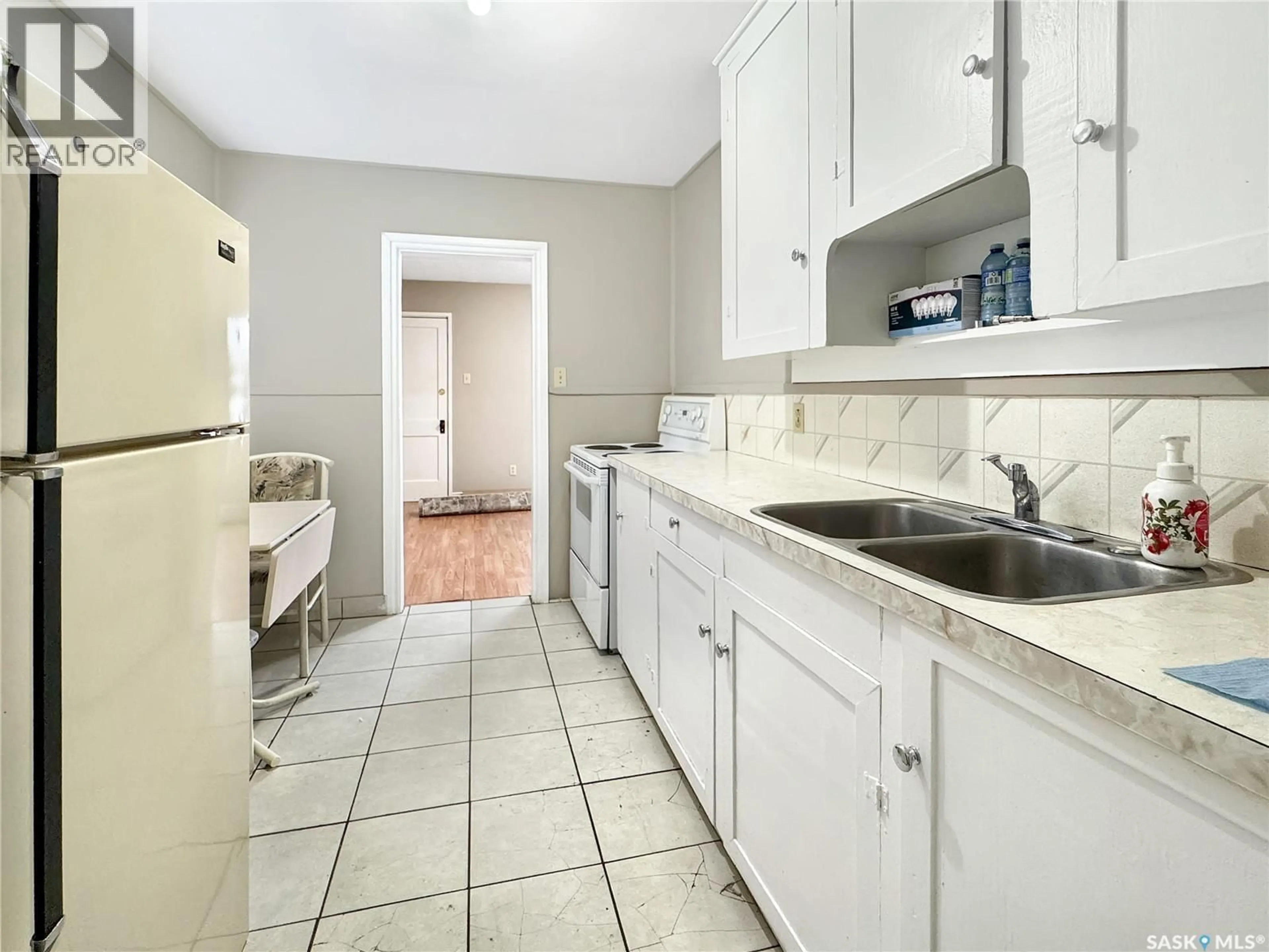 Standard kitchen, ceramic/tile floor for 1341 103RD STREET, North Battleford Saskatchewan S9A1K9