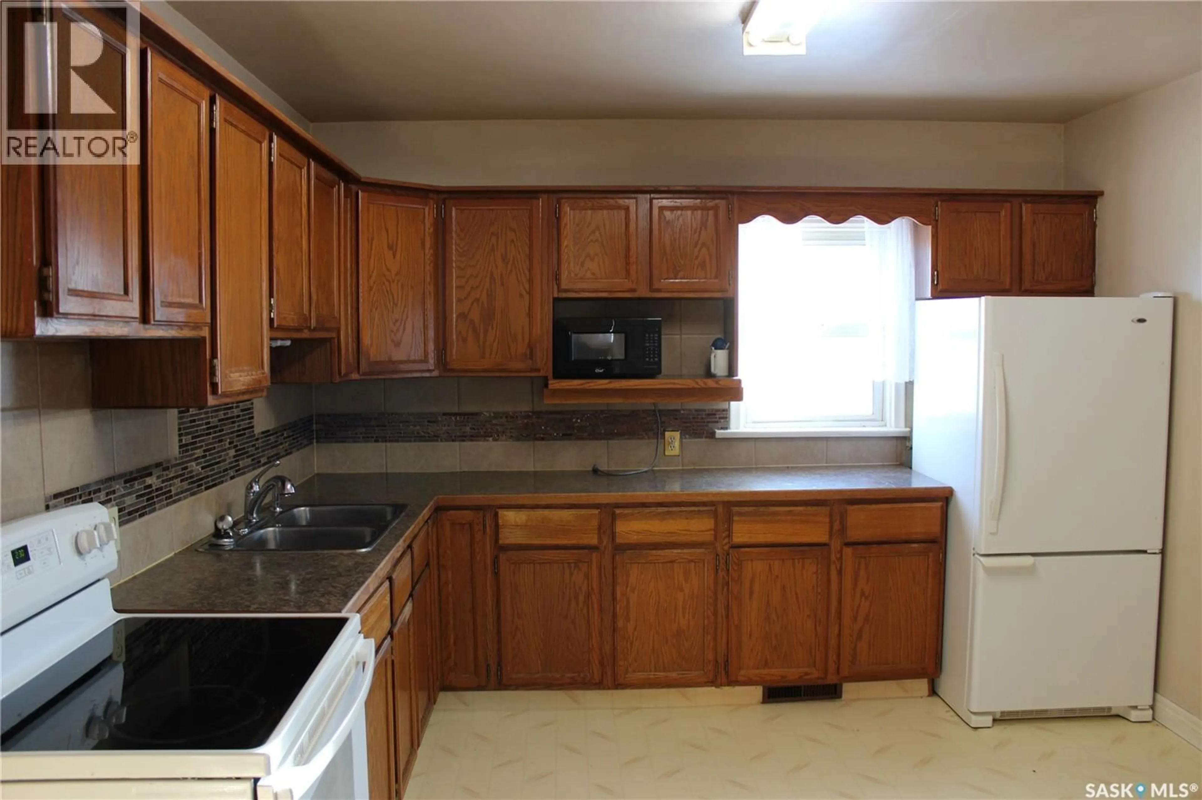 Standard kitchen, ceramic/tile floor for 210 TORBAY STREET, Torquay Saskatchewan S0C2L0